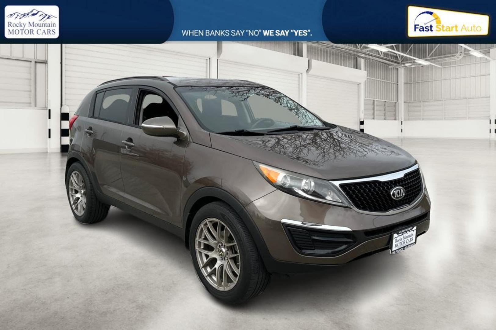 2014 Brown Kia Sportage LX FWD (KNDPB3AC6E7) with an 2.4L V6 DOHC 24V engine, 6-Speed Automatic transmission, located at 7755 State Street, Midvale, UT, 84047, (801) 753-9063, 40.610329, -111.890656 - Photo#0