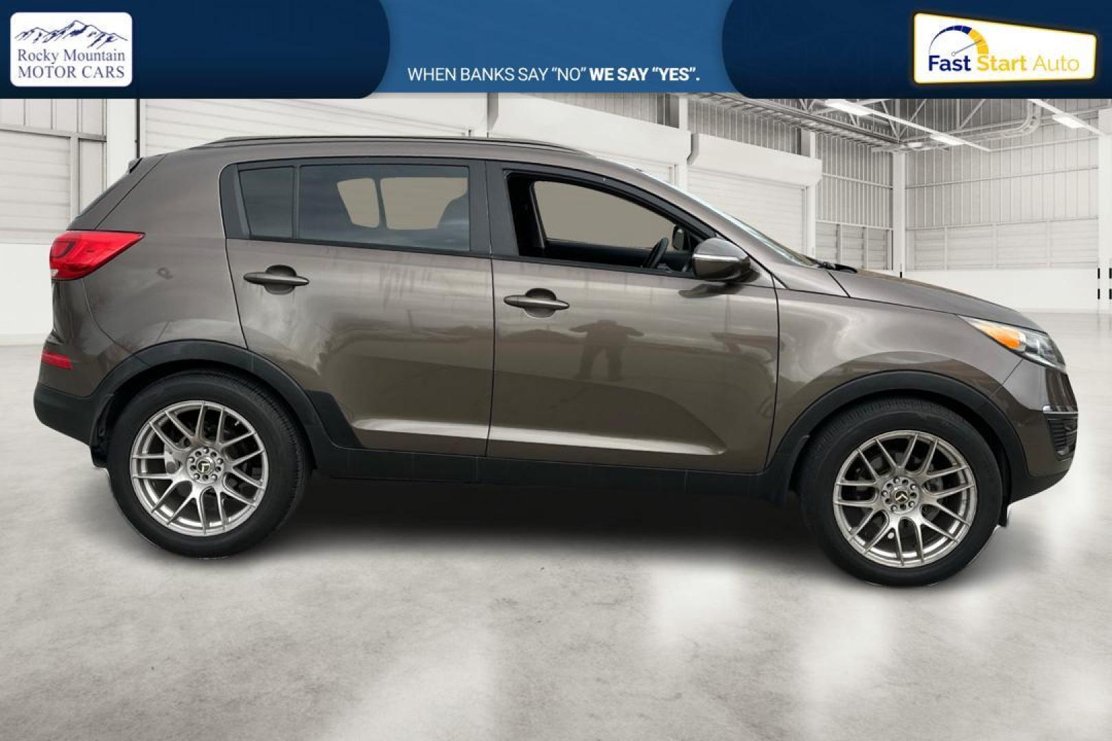 2014 Brown Kia Sportage LX FWD (KNDPB3AC6E7) with an 2.4L V6 DOHC 24V engine, 6-Speed Automatic transmission, located at 7755 State Street, Midvale, UT, 84047, (801) 753-9063, 40.610329, -111.890656 - Photo#1