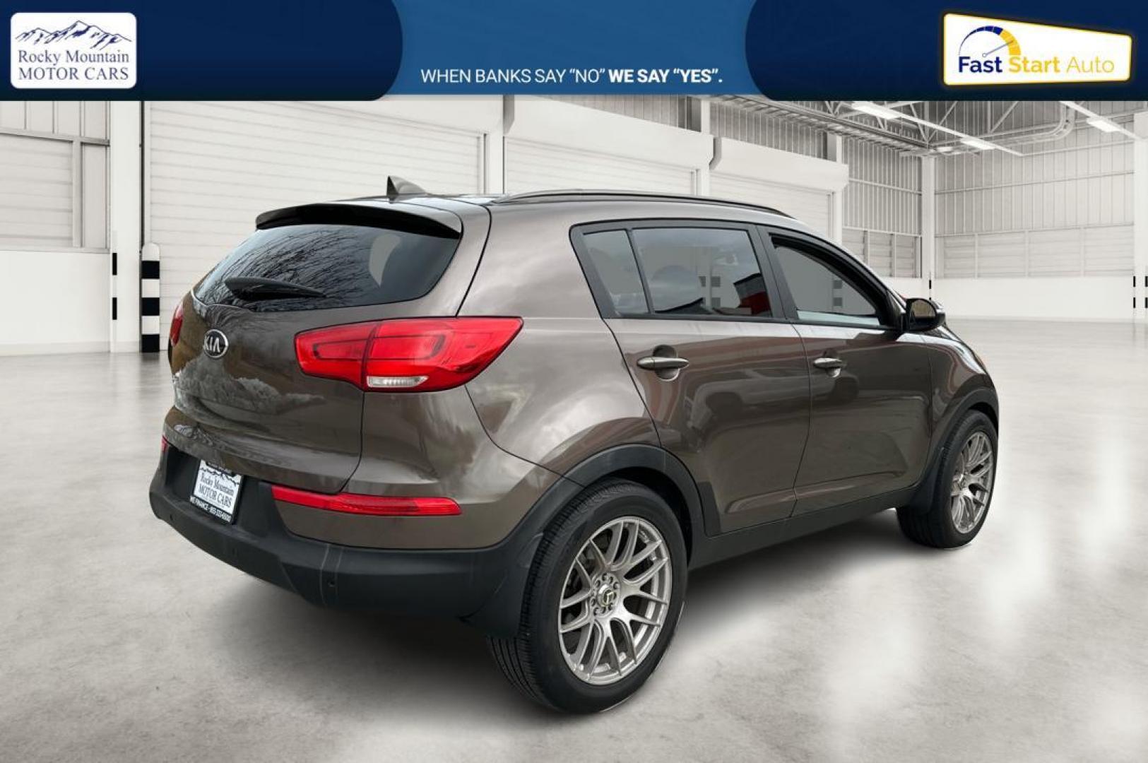 2014 Brown Kia Sportage LX FWD (KNDPB3AC6E7) with an 2.4L V6 DOHC 24V engine, 6-Speed Automatic transmission, located at 7755 State Street, Midvale, UT, 84047, (801) 753-9063, 40.610329, -111.890656 - Photo#2