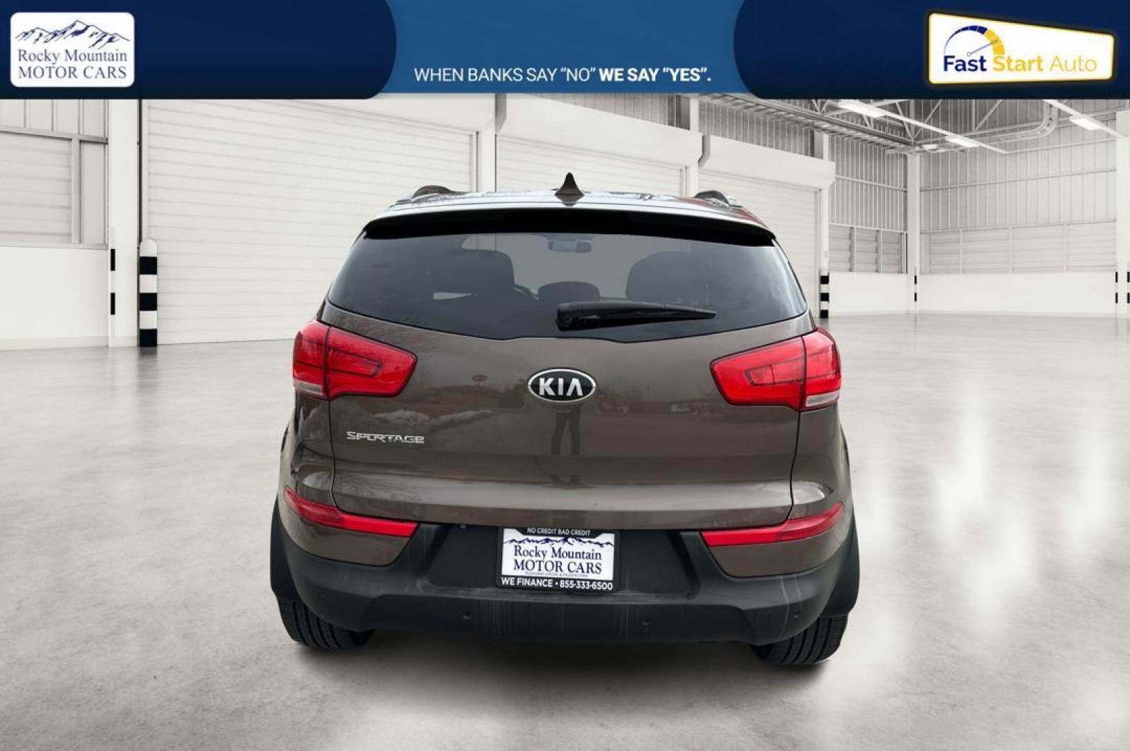 2014 Brown Kia Sportage LX FWD (KNDPB3AC6E7) with an 2.4L V6 DOHC 24V engine, 6-Speed Automatic transmission, located at 7755 State Street, Midvale, UT, 84047, (801) 753-9063, 40.610329, -111.890656 - Photo#4