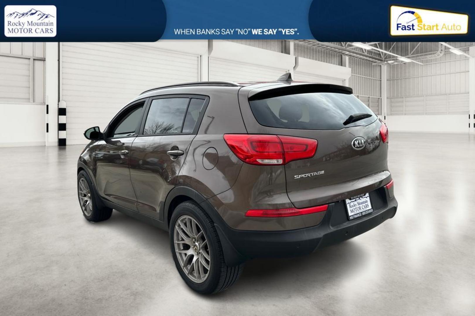 2014 Brown Kia Sportage LX FWD (KNDPB3AC6E7) with an 2.4L V6 DOHC 24V engine, 6-Speed Automatic transmission, located at 7755 State Street, Midvale, UT, 84047, (801) 753-9063, 40.610329, -111.890656 - Photo#5