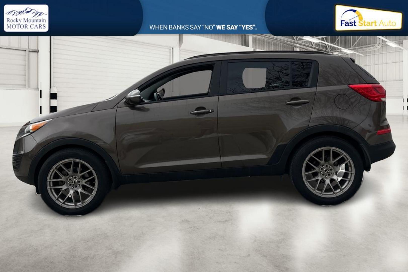 2014 Brown Kia Sportage LX FWD (KNDPB3AC6E7) with an 2.4L V6 DOHC 24V engine, 6-Speed Automatic transmission, located at 7755 State Street, Midvale, UT, 84047, (801) 753-9063, 40.610329, -111.890656 - Photo#6