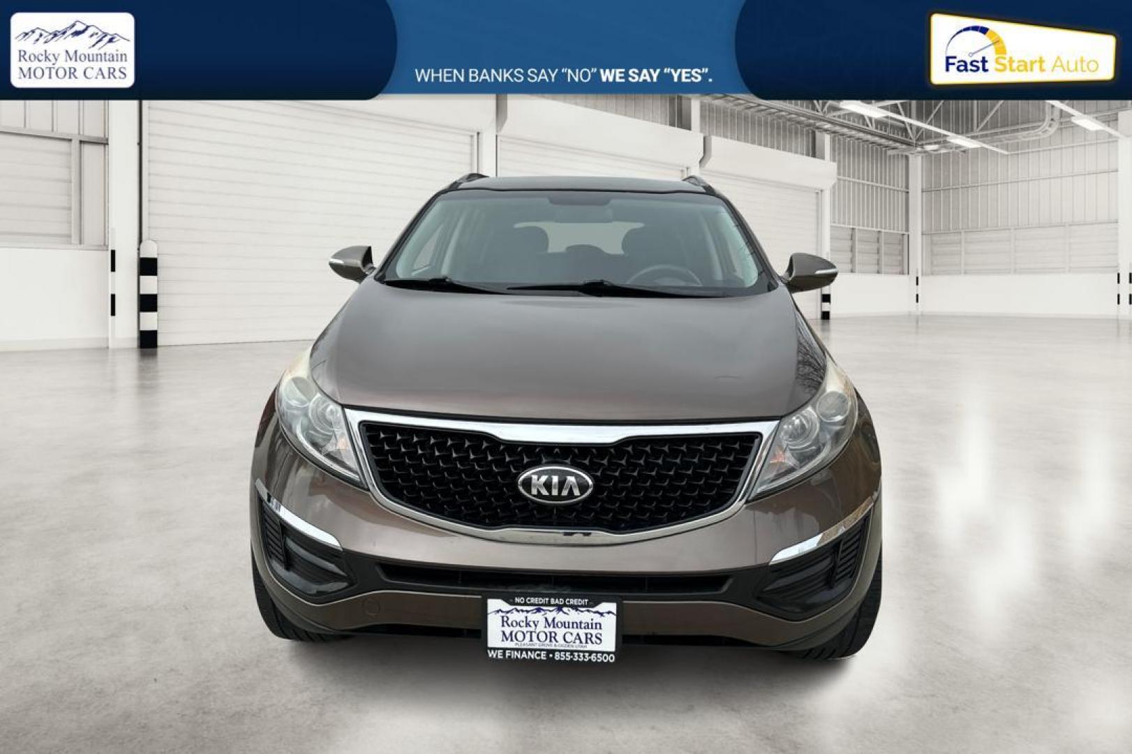 2014 Brown Kia Sportage LX FWD (KNDPB3AC6E7) with an 2.4L V6 DOHC 24V engine, 6-Speed Automatic transmission, located at 7755 State Street, Midvale, UT, 84047, (801) 753-9063, 40.610329, -111.890656 - Photo#9