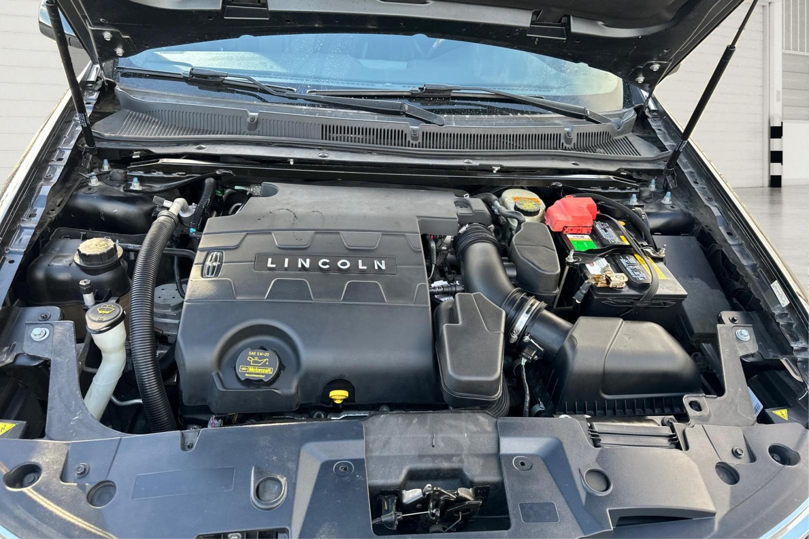 2014 Gray Lincoln MKS AWD (1LNHL9EKXEG) with an 3.5L V6 DOHC 24V engine, 6-Speed Automatic transmission, located at 7755 State Street, Midvale, UT, 84047, (801) 753-9063, 40.610329, -111.890656 - Photo#10