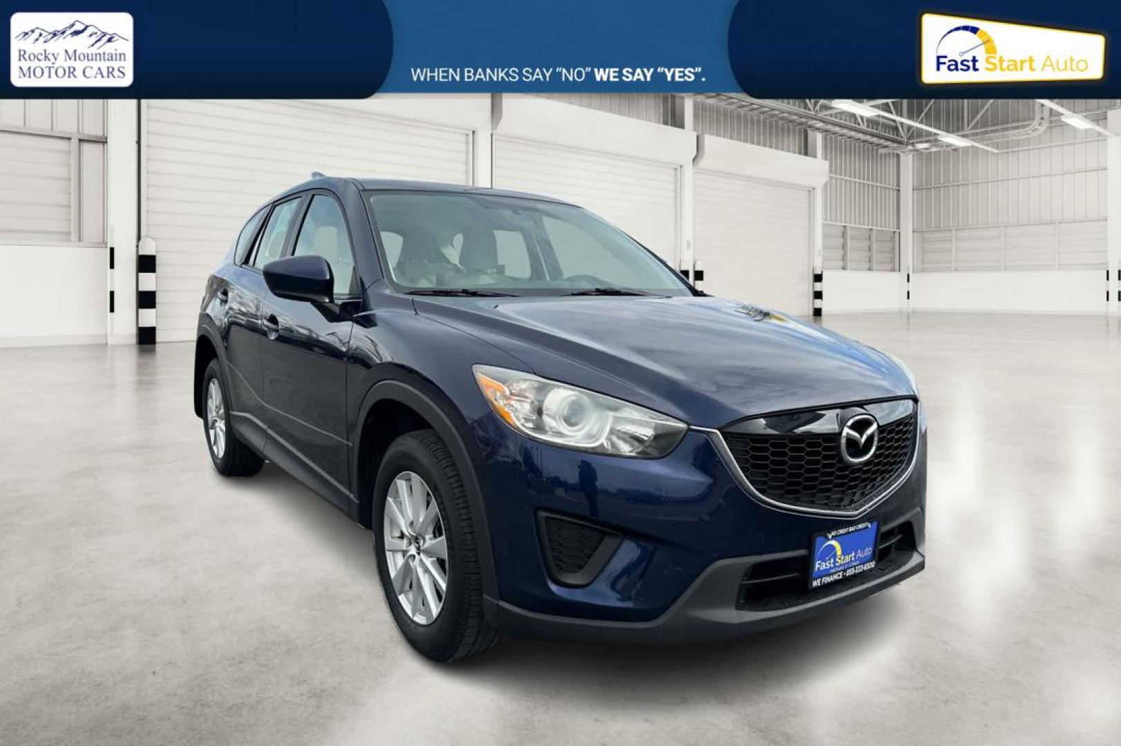 2014 Blue Mazda CX-5 Sport AT (JM3KE2BE7E0) with an 2.5L L4 DOHC 16V engine, 6-Speed Automatic transmission, located at 767 S State Road, Pleasant Grove, UT, 84062, (801) 785-1058, 40.354839, -111.736687 - Photo#0
