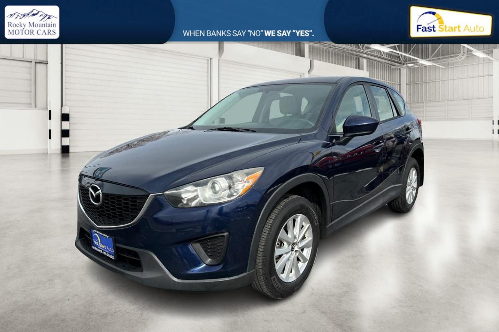 2014 Blue Mazda CX-5 Sport AT (JM3KE2BE7E0) with an 2.5L L4 DOHC 16V engine, 6-Speed Automatic transmission, located at 767 S State Road, Pleasant Grove, UT, 84062, (801) 785-1058, 40.354839, -111.736687 - Photo#8