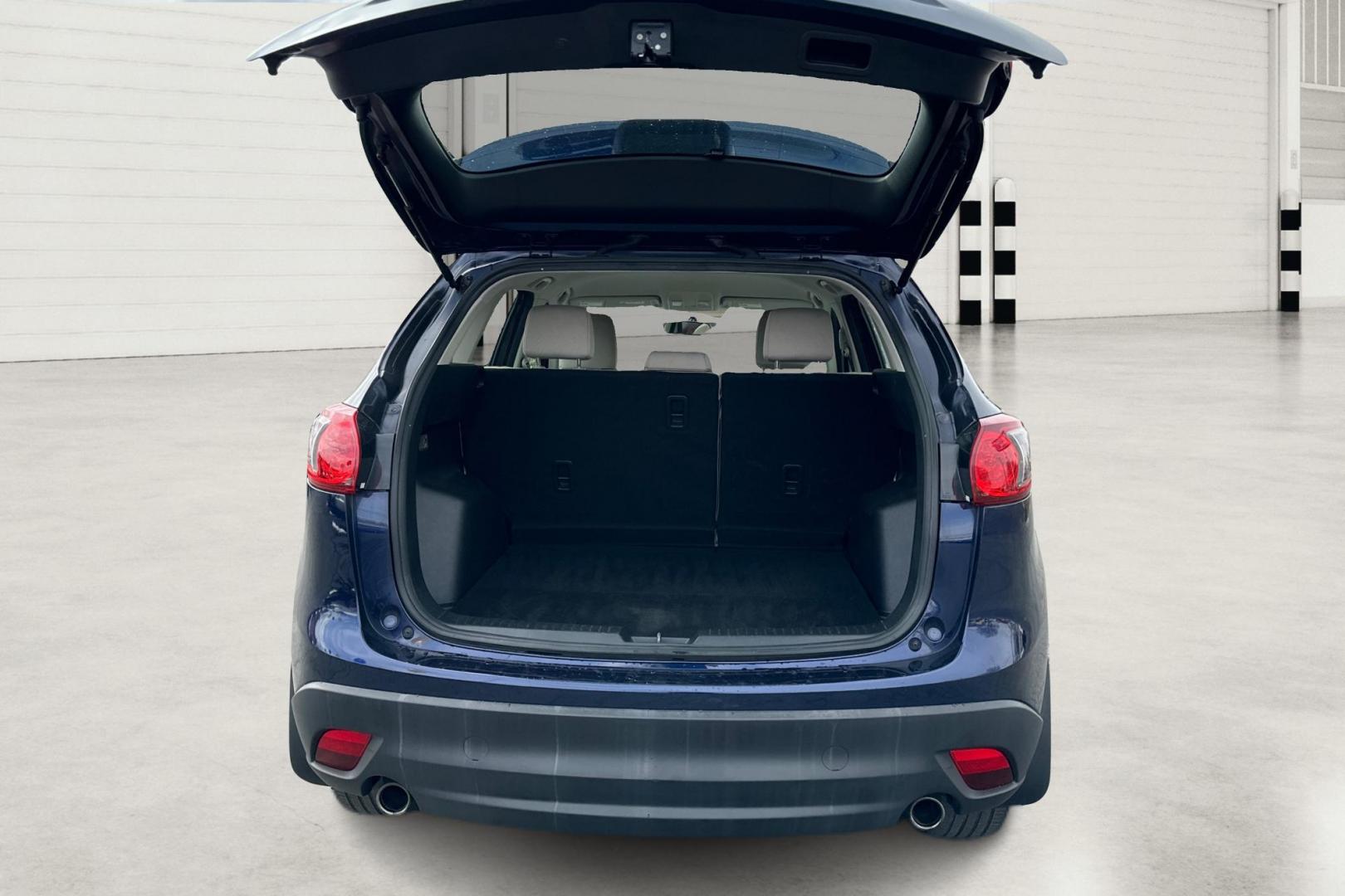 2014 Blue Mazda CX-5 Sport AT (JM3KE2BE7E0) with an 2.5L L4 DOHC 16V engine, 6-Speed Automatic transmission, located at 767 S State Road, Pleasant Grove, UT, 84062, (801) 785-1058, 40.354839, -111.736687 - Photo#13