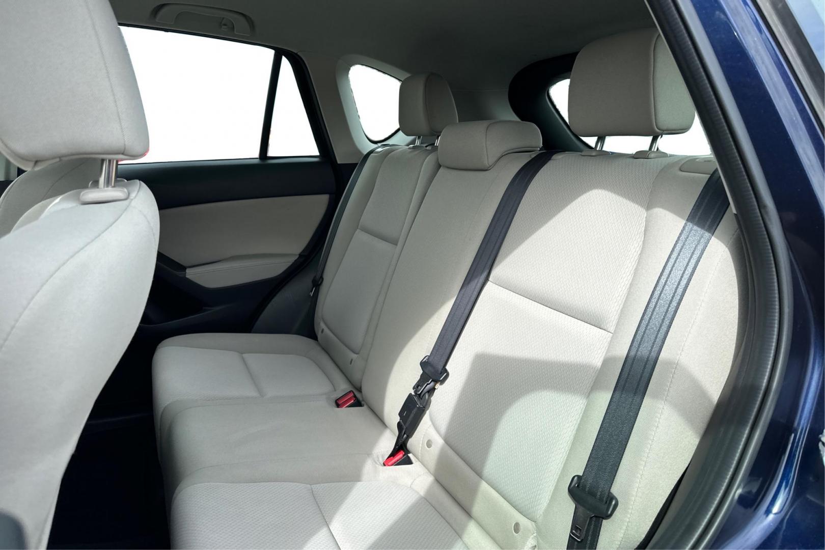 2014 Blue Mazda CX-5 Sport AT (JM3KE2BE7E0) with an 2.5L L4 DOHC 16V engine, 6-Speed Automatic transmission, located at 767 S State Road, Pleasant Grove, UT, 84062, (801) 785-1058, 40.354839, -111.736687 - Photo#15