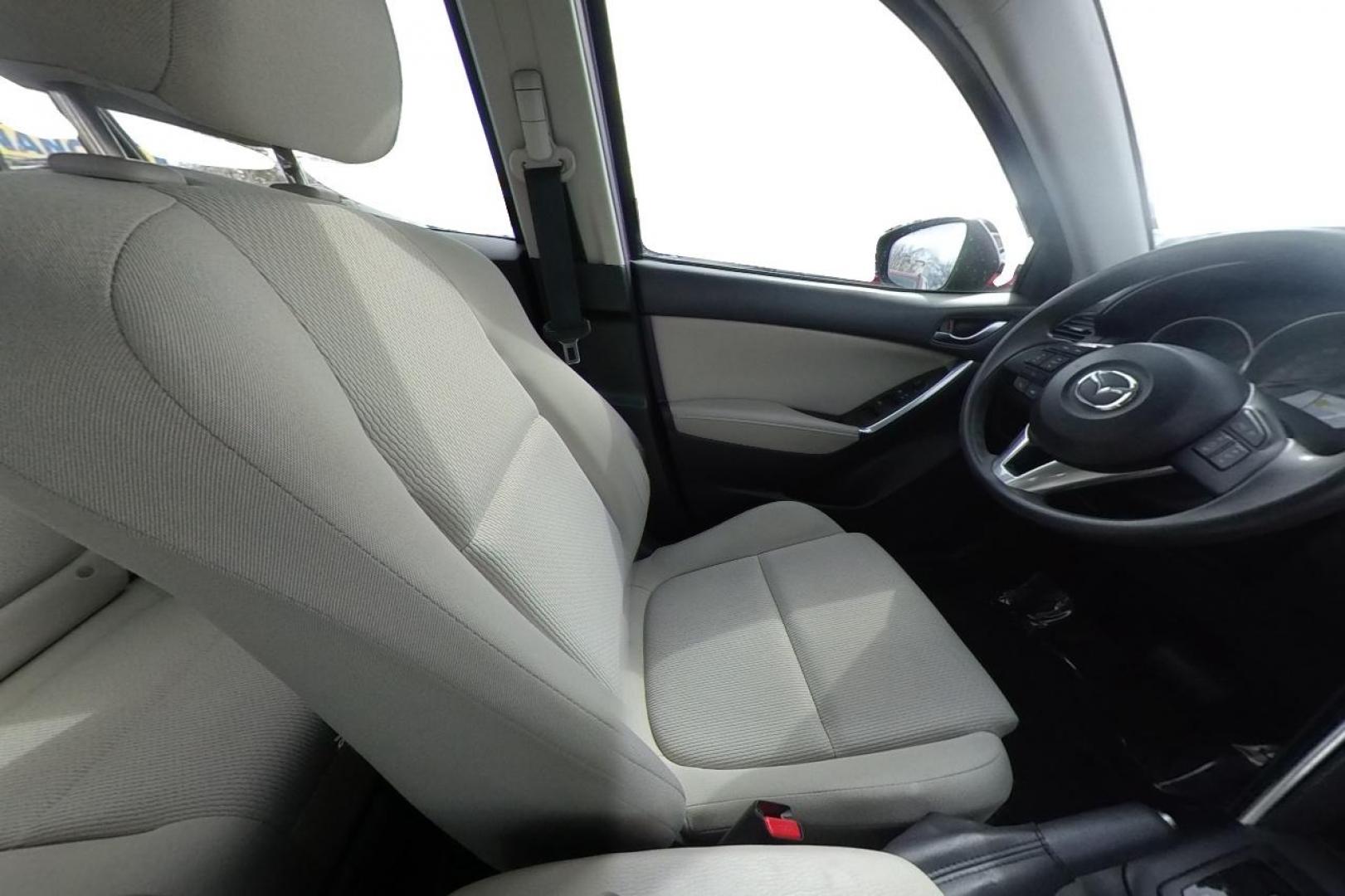 2014 Blue Mazda CX-5 Sport AT (JM3KE2BE7E0) with an 2.5L L4 DOHC 16V engine, 6-Speed Automatic transmission, located at 767 S State Road, Pleasant Grove, UT, 84062, (801) 785-1058, 40.354839, -111.736687 - Photo#19