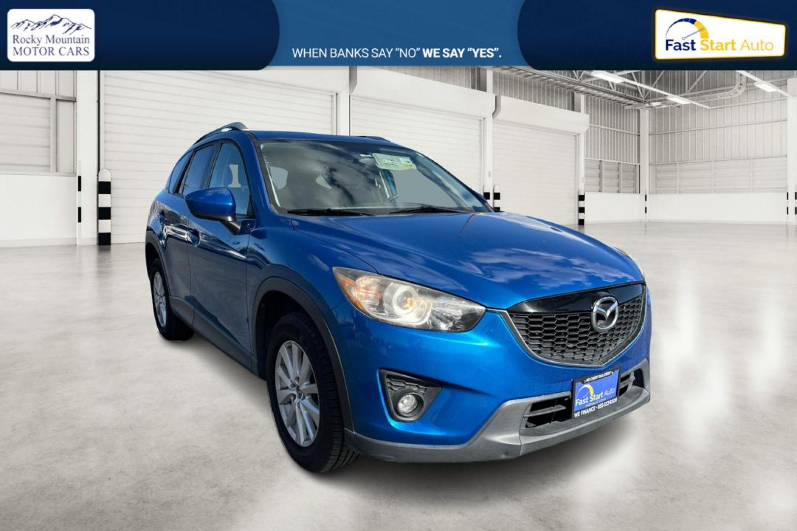 2014 Blue Mazda CX-5 Touring (JM3KE2CY1E0) with an 2.5L L4 DOHC 16V engine, 6-Speed Automatic transmission, located at 7755 State Street, Midvale, UT, 84047, (801) 753-9063, 40.610329, -111.890656 - Photo#0