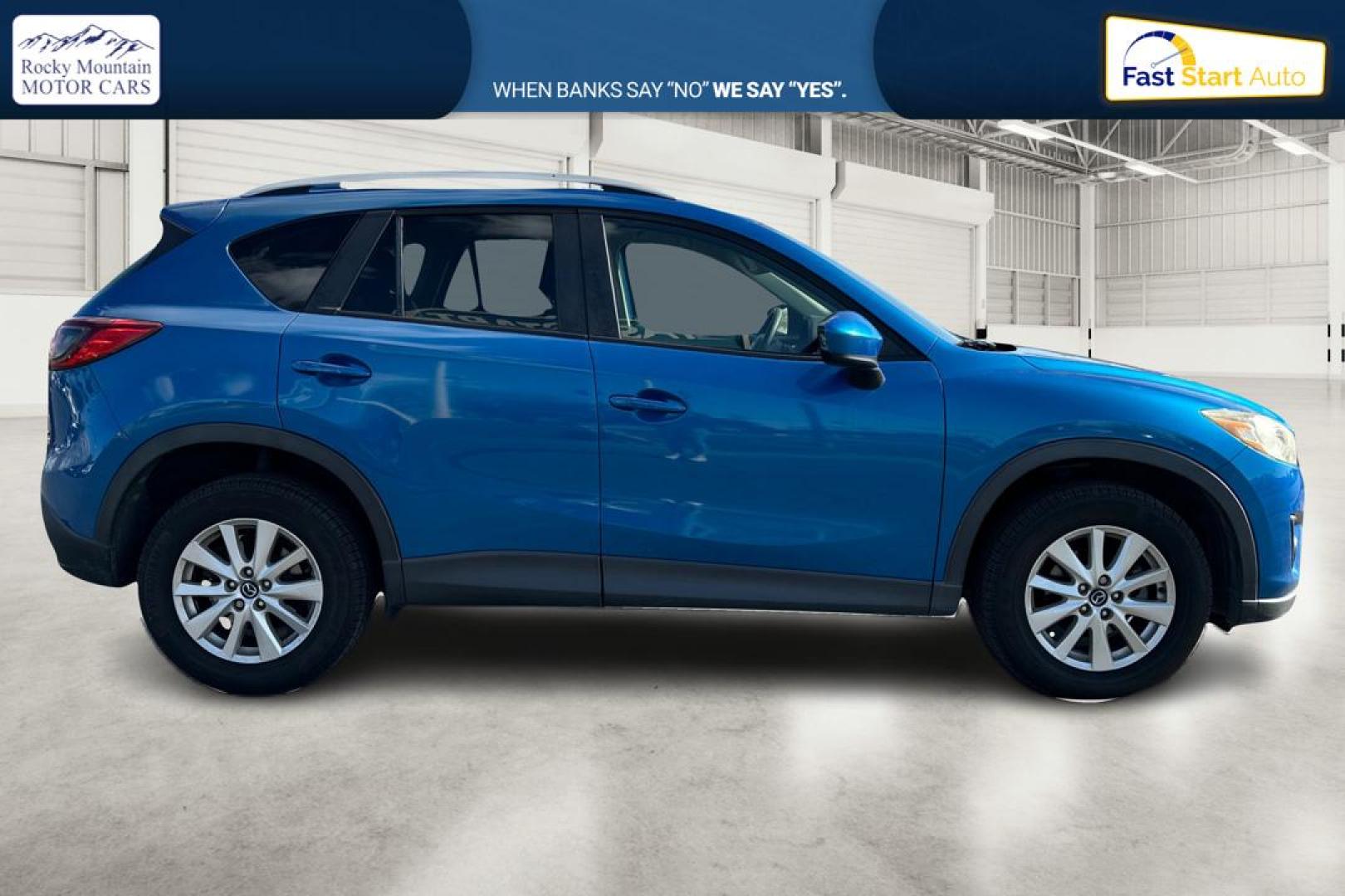 2014 Blue Mazda CX-5 Touring (JM3KE2CY1E0) with an 2.5L L4 DOHC 16V engine, 6-Speed Automatic transmission, located at 7755 State Street, Midvale, UT, 84047, (801) 753-9063, 40.610329, -111.890656 - Photo#1