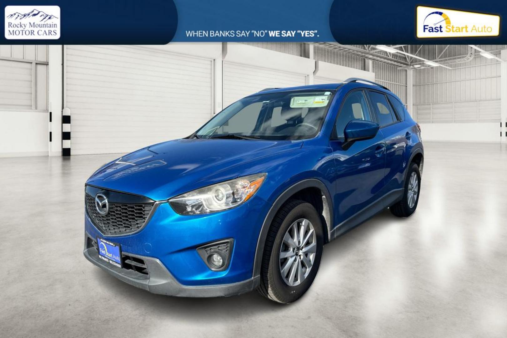 2014 Blue Mazda CX-5 Touring (JM3KE2CY1E0) with an 2.5L L4 DOHC 16V engine, 6-Speed Automatic transmission, located at 7755 State Street, Midvale, UT, 84047, (801) 753-9063, 40.610329, -111.890656 - Photo#8