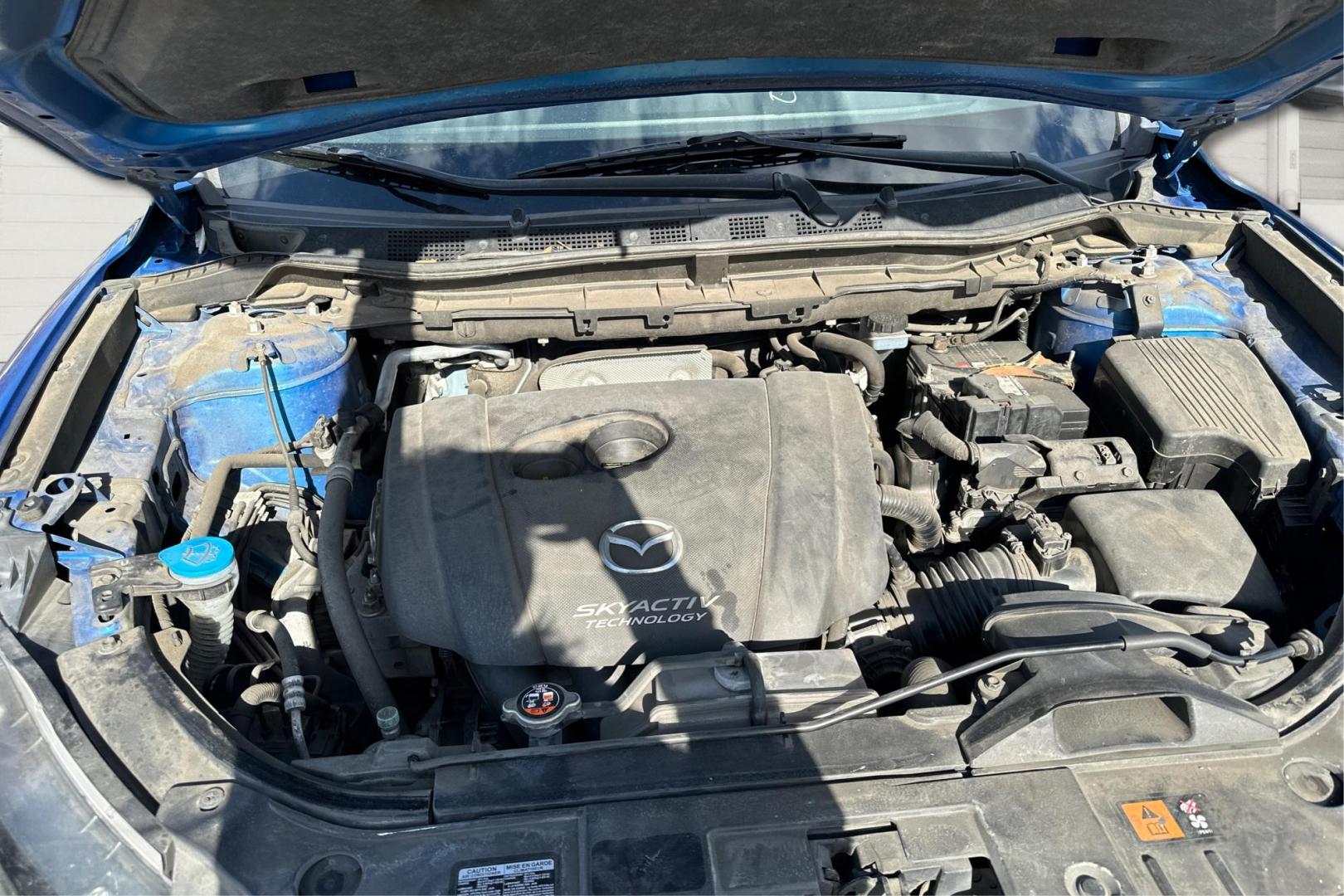 2014 Blue Mazda CX-5 Touring (JM3KE2CY1E0) with an 2.5L L4 DOHC 16V engine, 6-Speed Automatic transmission, located at 7755 State Street, Midvale, UT, 84047, (801) 753-9063, 40.610329, -111.890656 - Photo#10