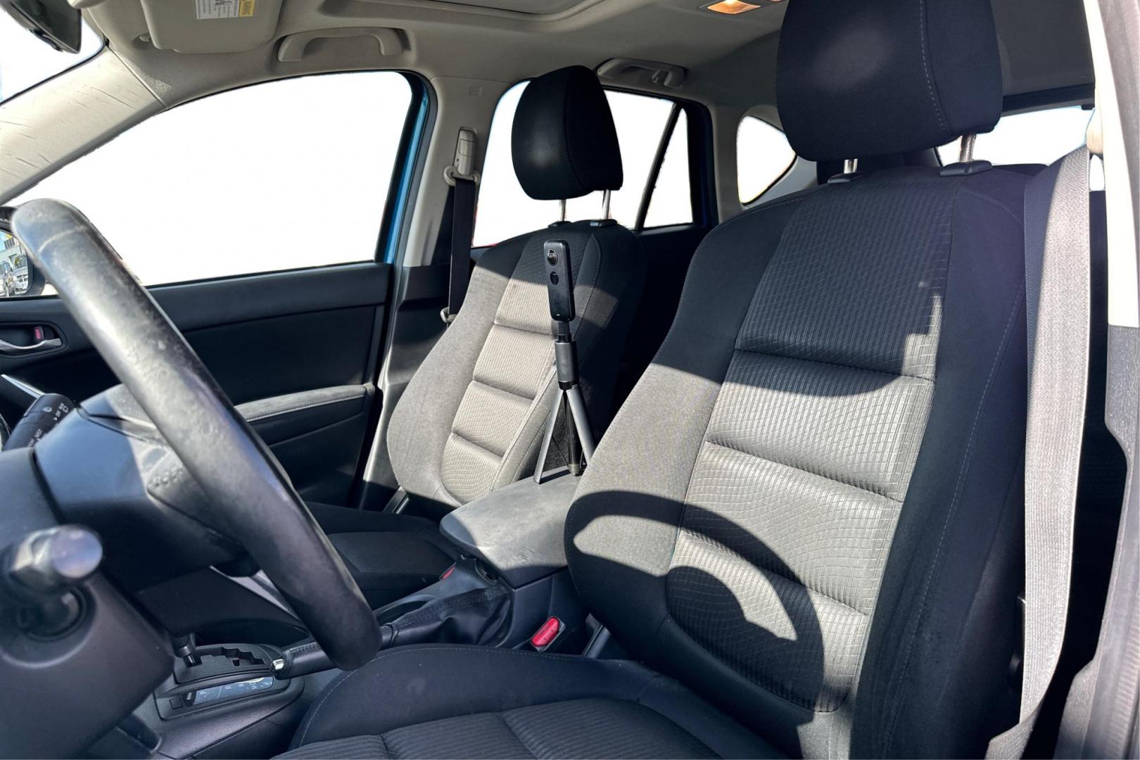 2014 Blue Mazda CX-5 Touring (JM3KE2CY1E0) with an 2.5L L4 DOHC 16V engine, 6-Speed Automatic transmission, located at 7755 State Street, Midvale, UT, 84047, (801) 753-9063, 40.610329, -111.890656 - Photo#13