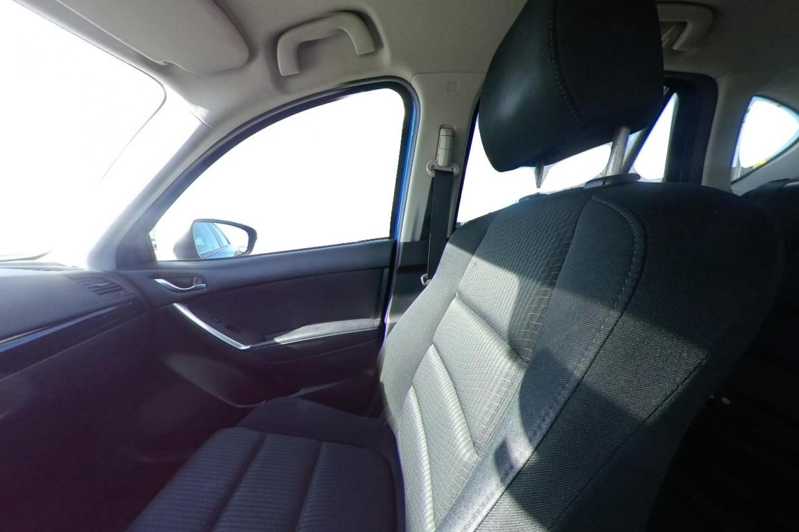 2014 Blue Mazda CX-5 Touring (JM3KE2CY1E0) with an 2.5L L4 DOHC 16V engine, 6-Speed Automatic transmission, located at 7755 State Street, Midvale, UT, 84047, (801) 753-9063, 40.610329, -111.890656 - Photo#16
