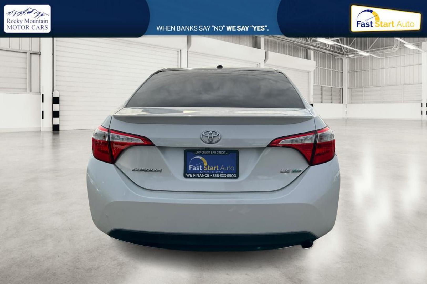 2014 White Toyota Corolla ECO CVT (5YFBPRHE1EP) with an 1.8L L4 DOHC 16V engine, Continuously Variable Transmission transmission, located at 767 S State Road, Pleasant Grove, UT, 84062, (801) 785-1058, 40.354839, -111.736687 - Photo#4