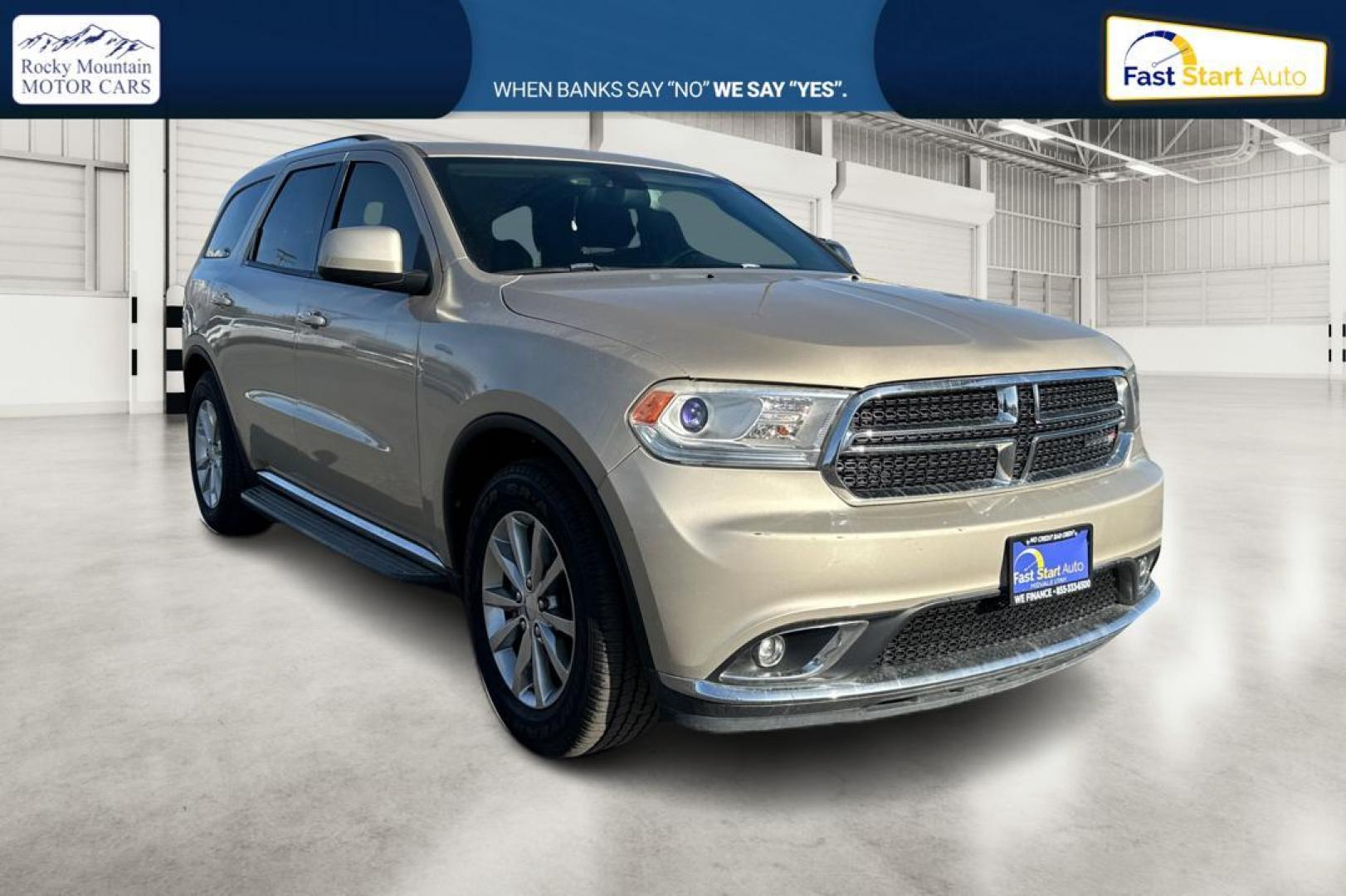 2015 Gold Dodge Durango SXT RWD (1C4RDHAG4FC) with an 3.6L V6 DOHC 24V engine, 8-Speed Automatic transmission, located at 7755 State Street, Midvale, UT, 84047, (801) 753-9063, 40.610329, -111.890656 - Photo#0
