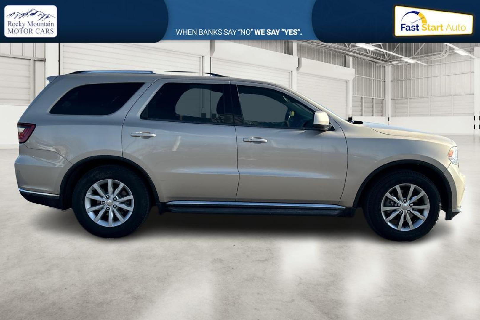 2015 Gold Dodge Durango SXT RWD (1C4RDHAG4FC) with an 3.6L V6 DOHC 24V engine, 8-Speed Automatic transmission, located at 7755 State Street, Midvale, UT, 84047, (801) 753-9063, 40.610329, -111.890656 - Photo#1