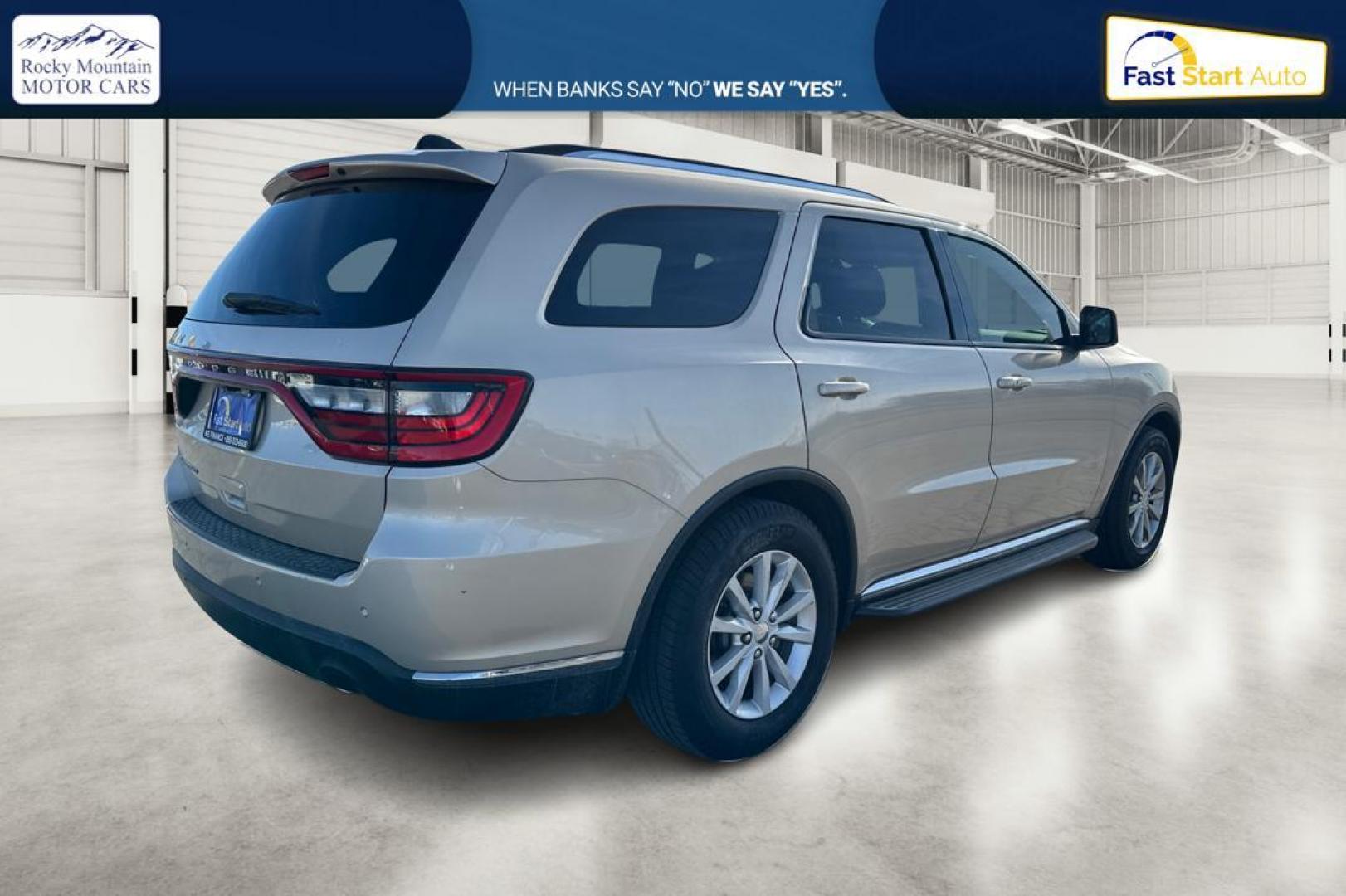2015 Gold Dodge Durango SXT RWD (1C4RDHAG4FC) with an 3.6L V6 DOHC 24V engine, 8-Speed Automatic transmission, located at 7755 State Street, Midvale, UT, 84047, (801) 753-9063, 40.610329, -111.890656 - Photo#2