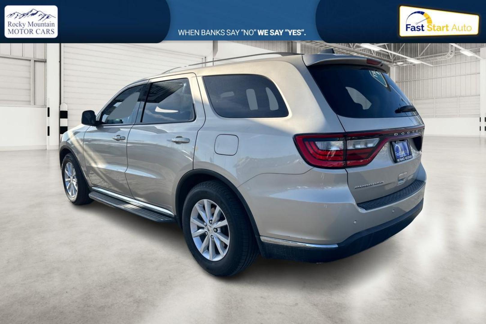 2015 Gold Dodge Durango SXT RWD (1C4RDHAG4FC) with an 3.6L V6 DOHC 24V engine, 8-Speed Automatic transmission, located at 7755 State Street, Midvale, UT, 84047, (801) 753-9063, 40.610329, -111.890656 - Photo#5