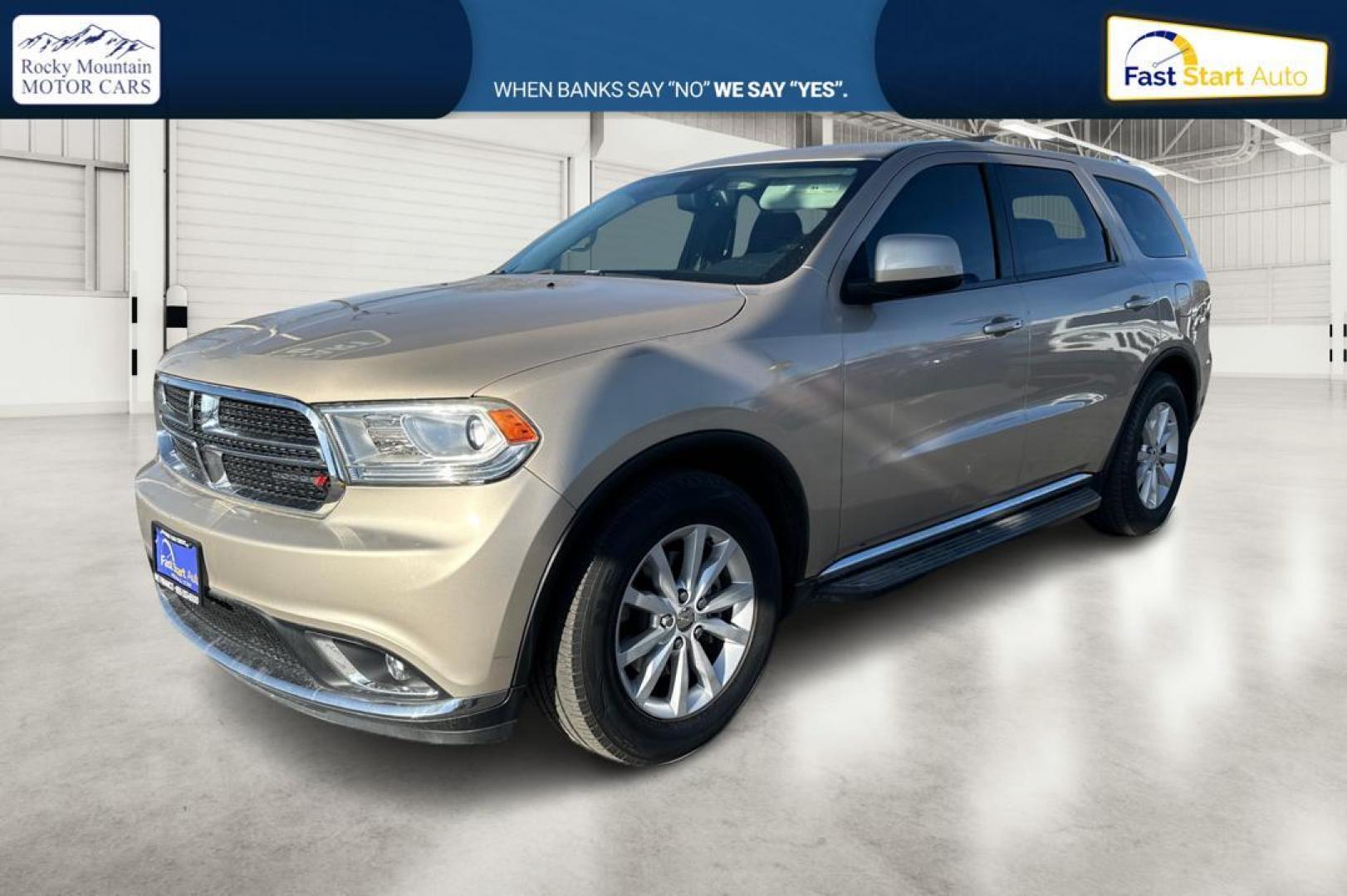 2015 Gold Dodge Durango SXT RWD (1C4RDHAG4FC) with an 3.6L V6 DOHC 24V engine, 8-Speed Automatic transmission, located at 7755 State Street, Midvale, UT, 84047, (801) 753-9063, 40.610329, -111.890656 - Photo#8