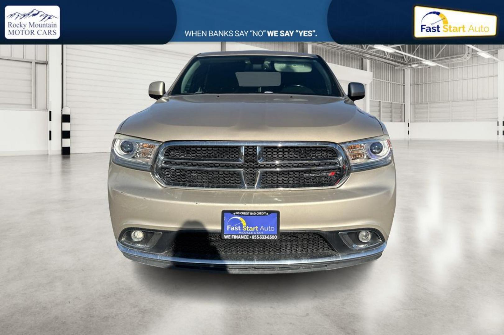 2015 Gold Dodge Durango SXT RWD (1C4RDHAG4FC) with an 3.6L V6 DOHC 24V engine, 8-Speed Automatic transmission, located at 7755 State Street, Midvale, UT, 84047, (801) 753-9063, 40.610329, -111.890656 - Photo#9