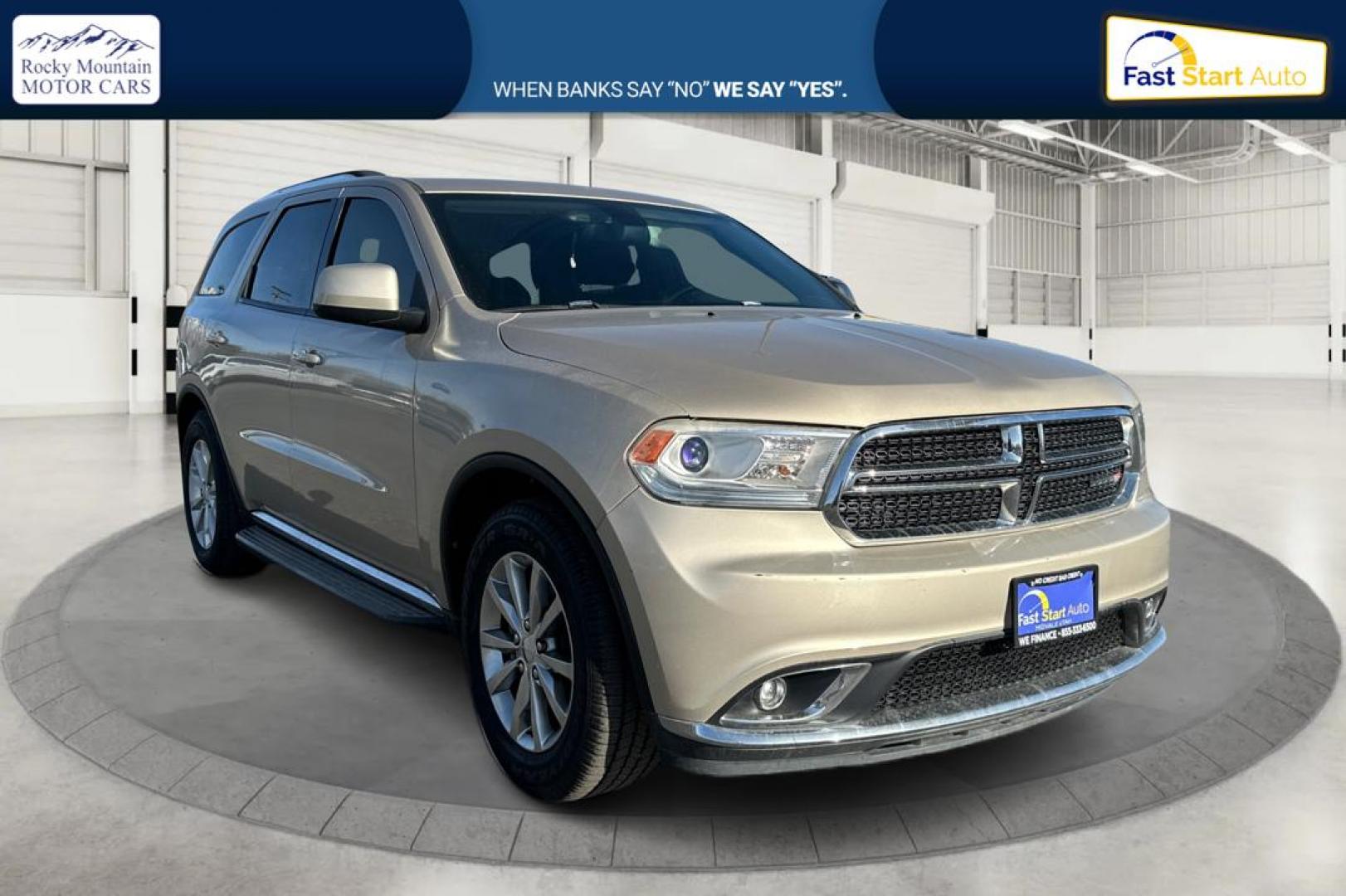 2015 Gold Dodge Durango SXT RWD (1C4RDHAG4FC) with an 3.6L V6 DOHC 24V engine, 8-Speed Automatic transmission, located at 7755 State Street, Midvale, UT, 84047, (801) 753-9063, 40.610329, -111.890656 - Photo#0
