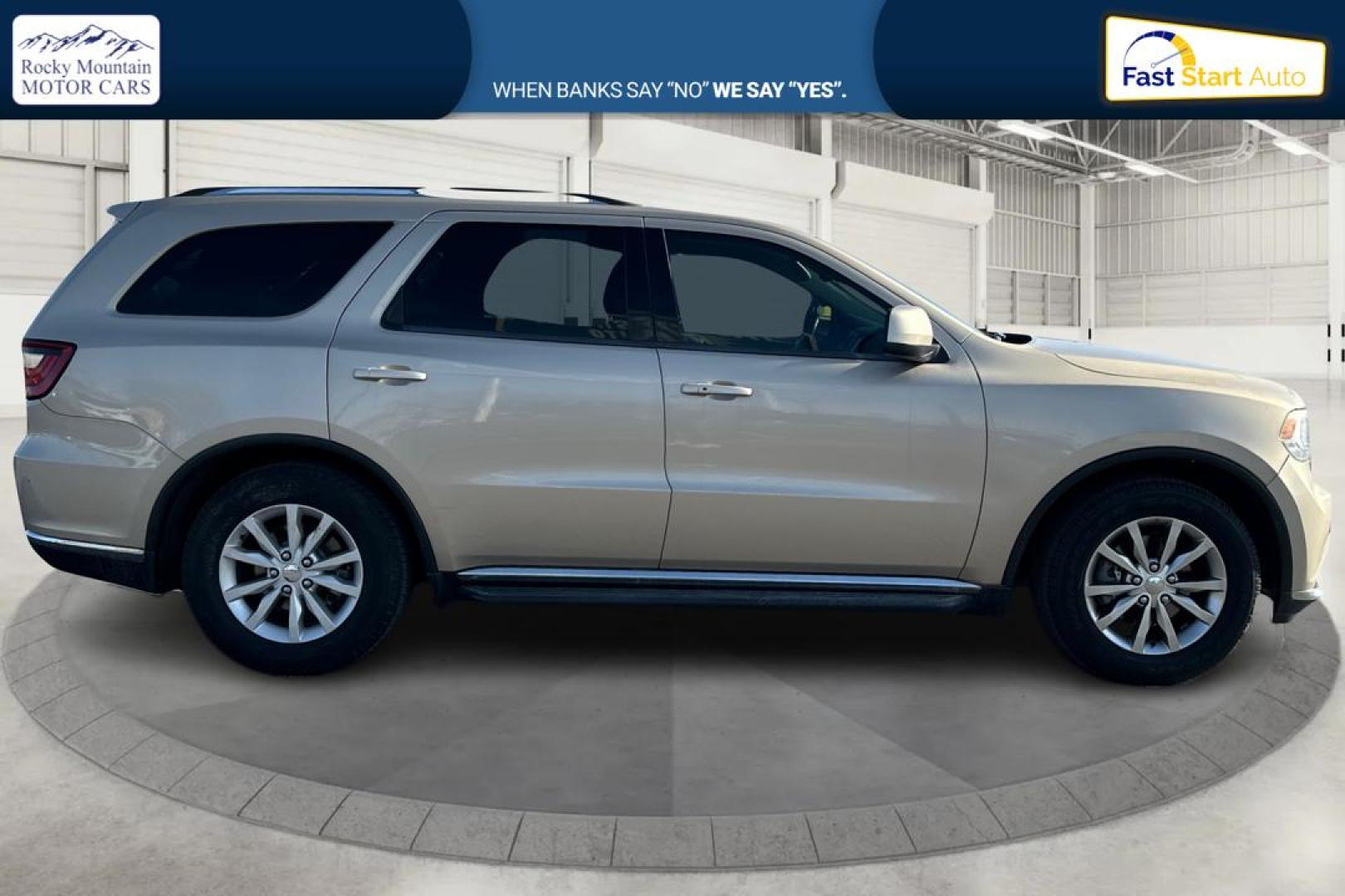 2015 Gold Dodge Durango SXT RWD (1C4RDHAG4FC) with an 3.6L V6 DOHC 24V engine, 8-Speed Automatic transmission, located at 7755 State Street, Midvale, UT, 84047, (801) 753-9063, 40.610329, -111.890656 - Photo#1