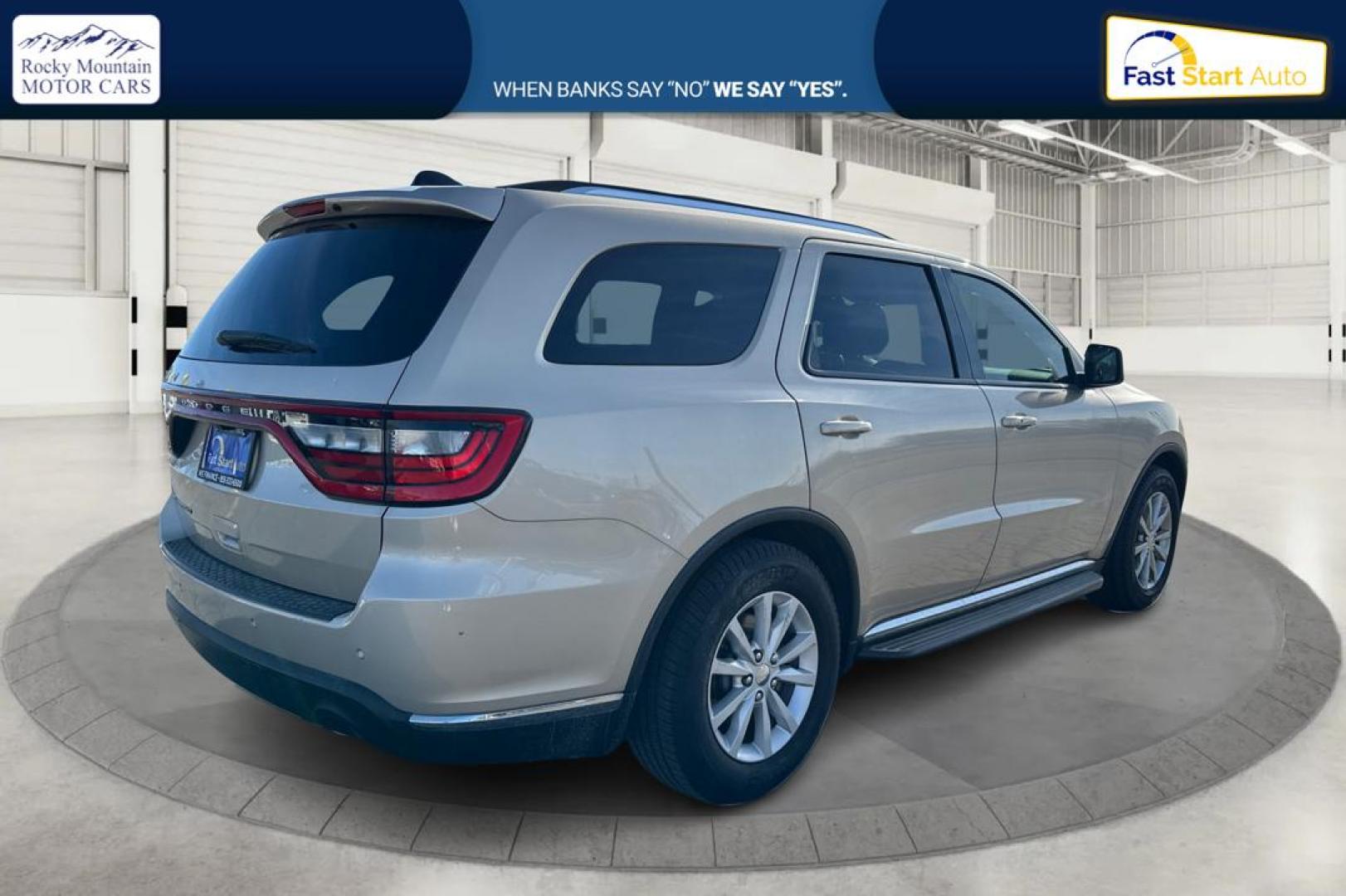 2015 Gold Dodge Durango SXT RWD (1C4RDHAG4FC) with an 3.6L V6 DOHC 24V engine, 8-Speed Automatic transmission, located at 7755 State Street, Midvale, UT, 84047, (801) 753-9063, 40.610329, -111.890656 - Photo#2