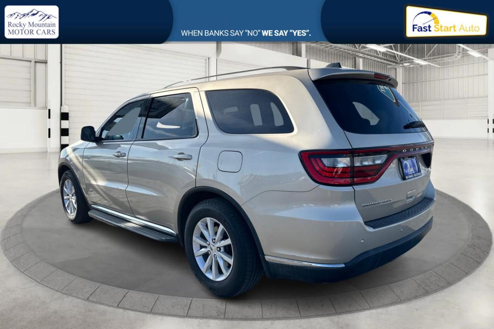 2015 Gold Dodge Durango SXT RWD (1C4RDHAG4FC) with an 3.6L V6 DOHC 24V engine, 8-Speed Automatic transmission, located at 7755 State Street, Midvale, UT, 84047, (801) 753-9063, 40.610329, -111.890656 - Photo#4
