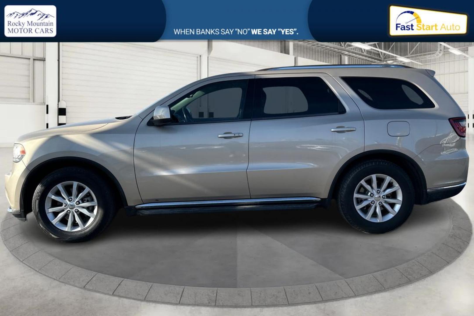 2015 Gold Dodge Durango SXT RWD (1C4RDHAG4FC) with an 3.6L V6 DOHC 24V engine, 8-Speed Automatic transmission, located at 7755 State Street, Midvale, UT, 84047, (801) 753-9063, 40.610329, -111.890656 - Photo#5