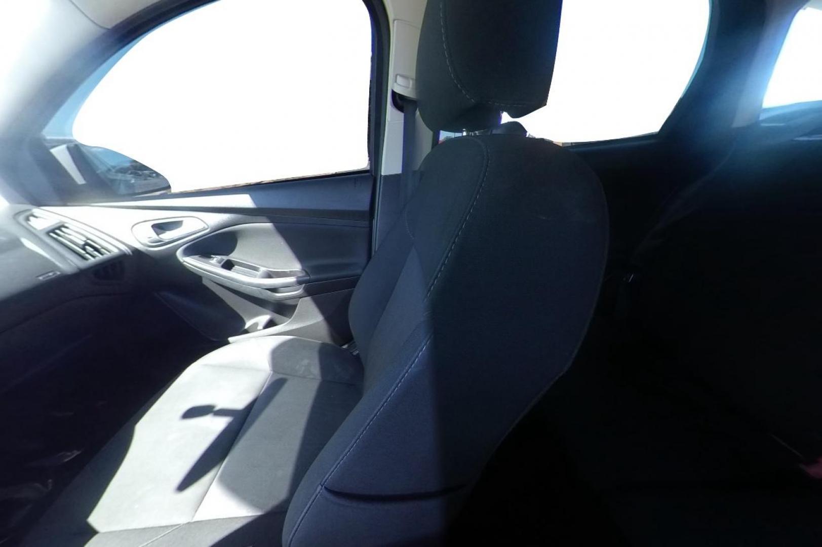2015 White Ford Focus SE Hatch (1FADP3K23FL) with an 2.0L L4 DOHC 16V engine, 5-Speed Manual transmission, located at 7755 State Street, Midvale, UT, 84047, (801) 753-9063, 40.610329, -111.890656 - Photo#14