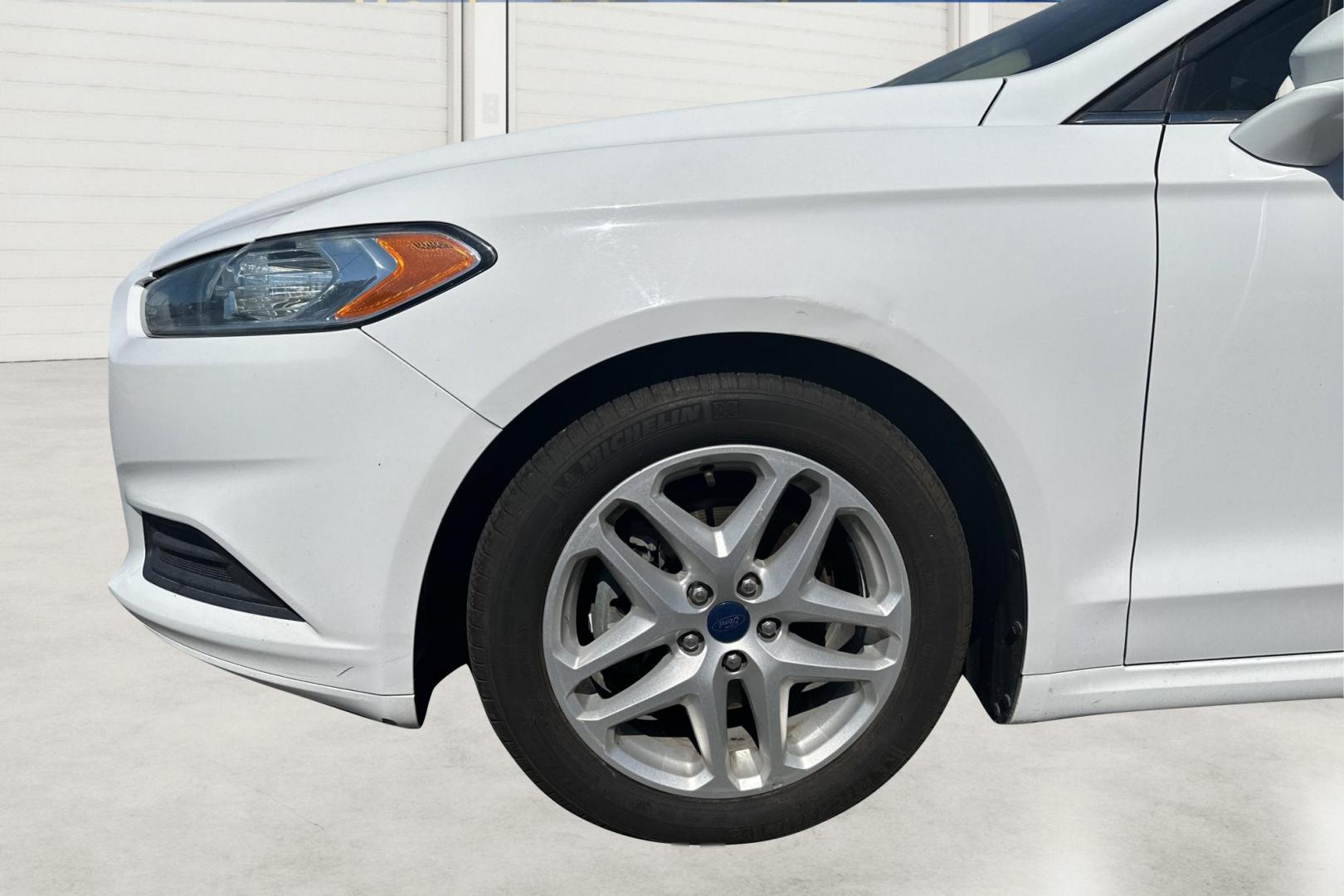2015 White Ford Fusion SE (3FA6P0H71FR) with an 2.5L L4 DOHC 16V engine, Auto, 6-Spd w/SelShft transmission, located at 7755 State Street, Midvale, UT, 84047, (801) 753-9063, 40.610329, -111.890656 - Photo#12