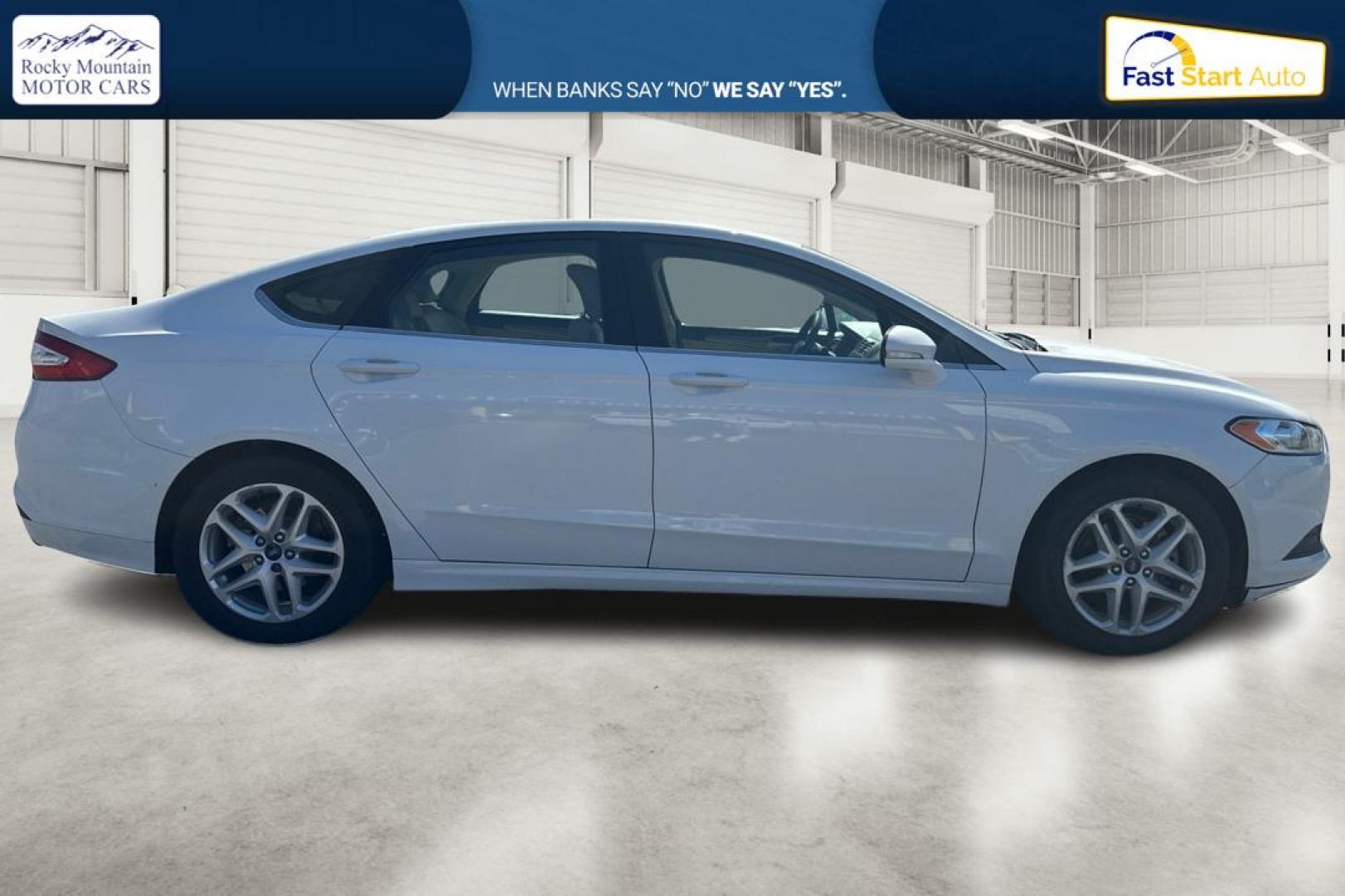2015 White Ford Fusion SE (3FA6P0H71FR) with an 2.5L L4 DOHC 16V engine, Auto, 6-Spd w/SelShft transmission, located at 7755 State Street, Midvale, UT, 84047, (801) 753-9063, 40.610329, -111.890656 - Photo#1