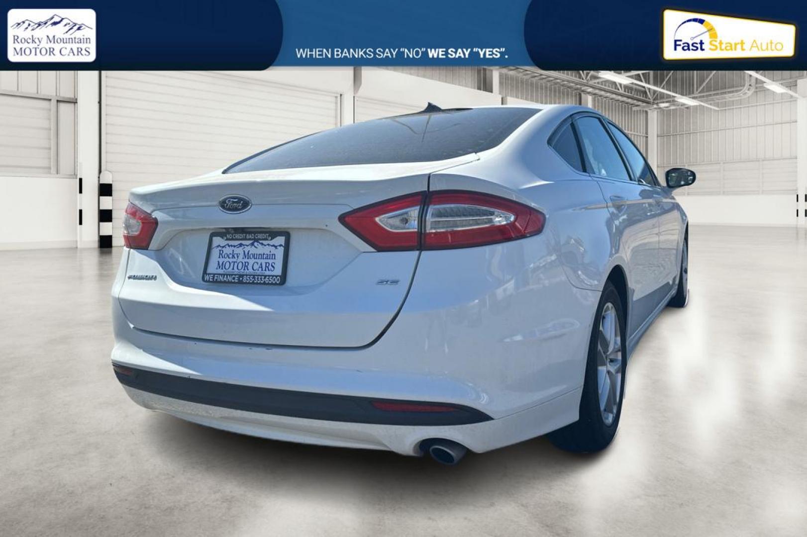 2015 White Ford Fusion SE (3FA6P0H71FR) with an 2.5L L4 DOHC 16V engine, Auto, 6-Spd w/SelShft transmission, located at 7755 State Street, Midvale, UT, 84047, (801) 753-9063, 40.610329, -111.890656 - Photo#2
