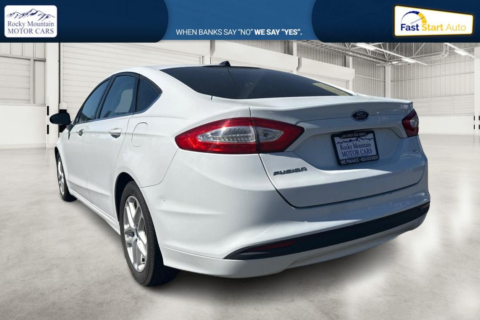 2015 White Ford Fusion SE (3FA6P0H71FR) with an 2.5L L4 DOHC 16V engine, Auto, 6-Spd w/SelShft transmission, located at 7755 State Street, Midvale, UT, 84047, (801) 753-9063, 40.610329, -111.890656 - Photo#5