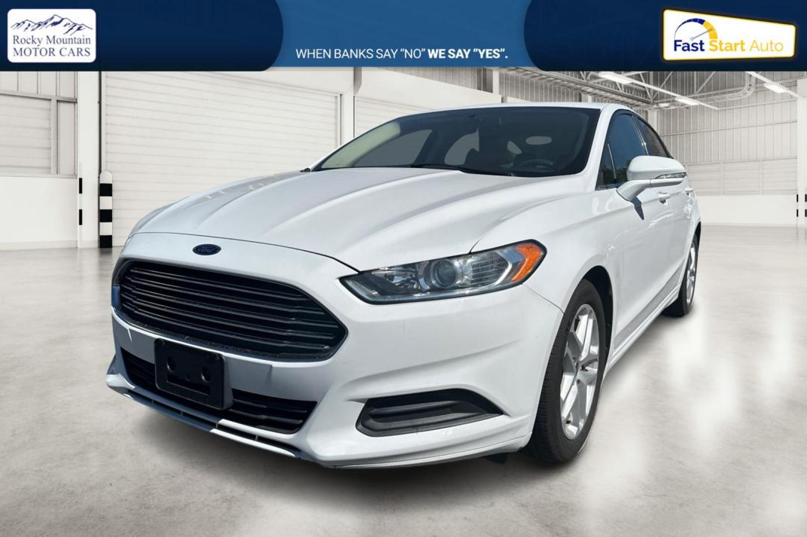 2015 White Ford Fusion SE (3FA6P0H71FR) with an 2.5L L4 DOHC 16V engine, Auto, 6-Spd w/SelShft transmission, located at 7755 State Street, Midvale, UT, 84047, (801) 753-9063, 40.610329, -111.890656 - Photo#8