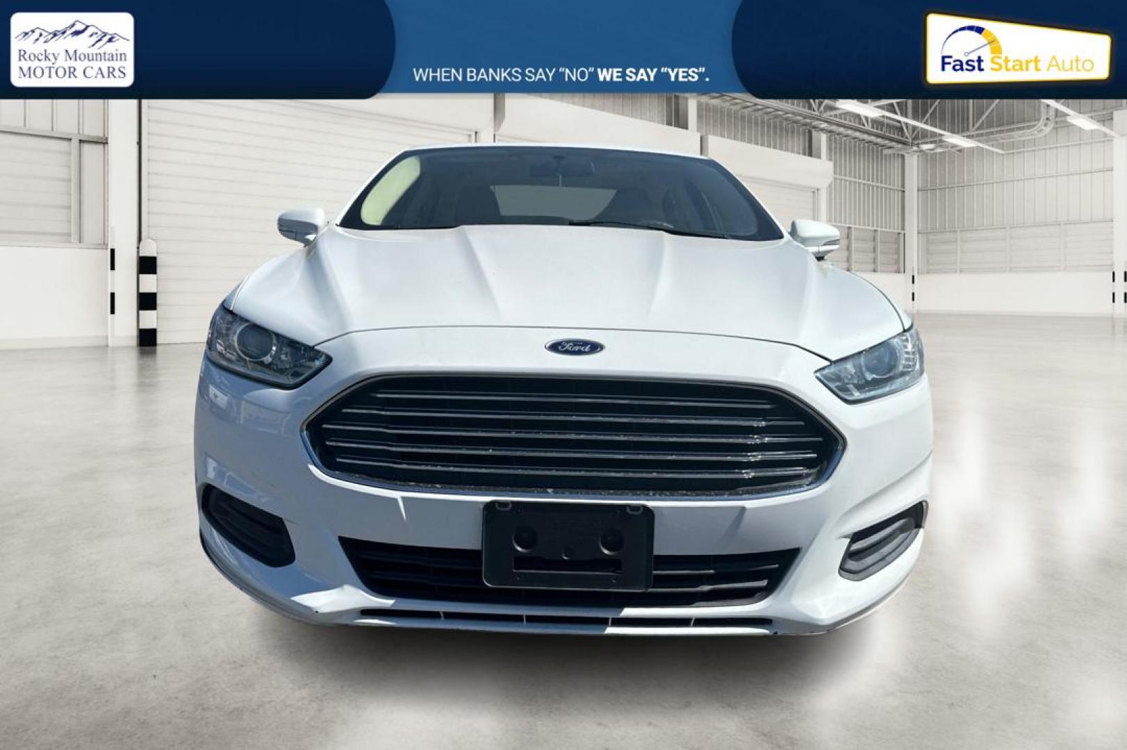 2015 White Ford Fusion SE (3FA6P0H71FR) with an 2.5L L4 DOHC 16V engine, Auto, 6-Spd w/SelShft transmission, located at 7755 State Street, Midvale, UT, 84047, (801) 753-9063, 40.610329, -111.890656 - Photo#9