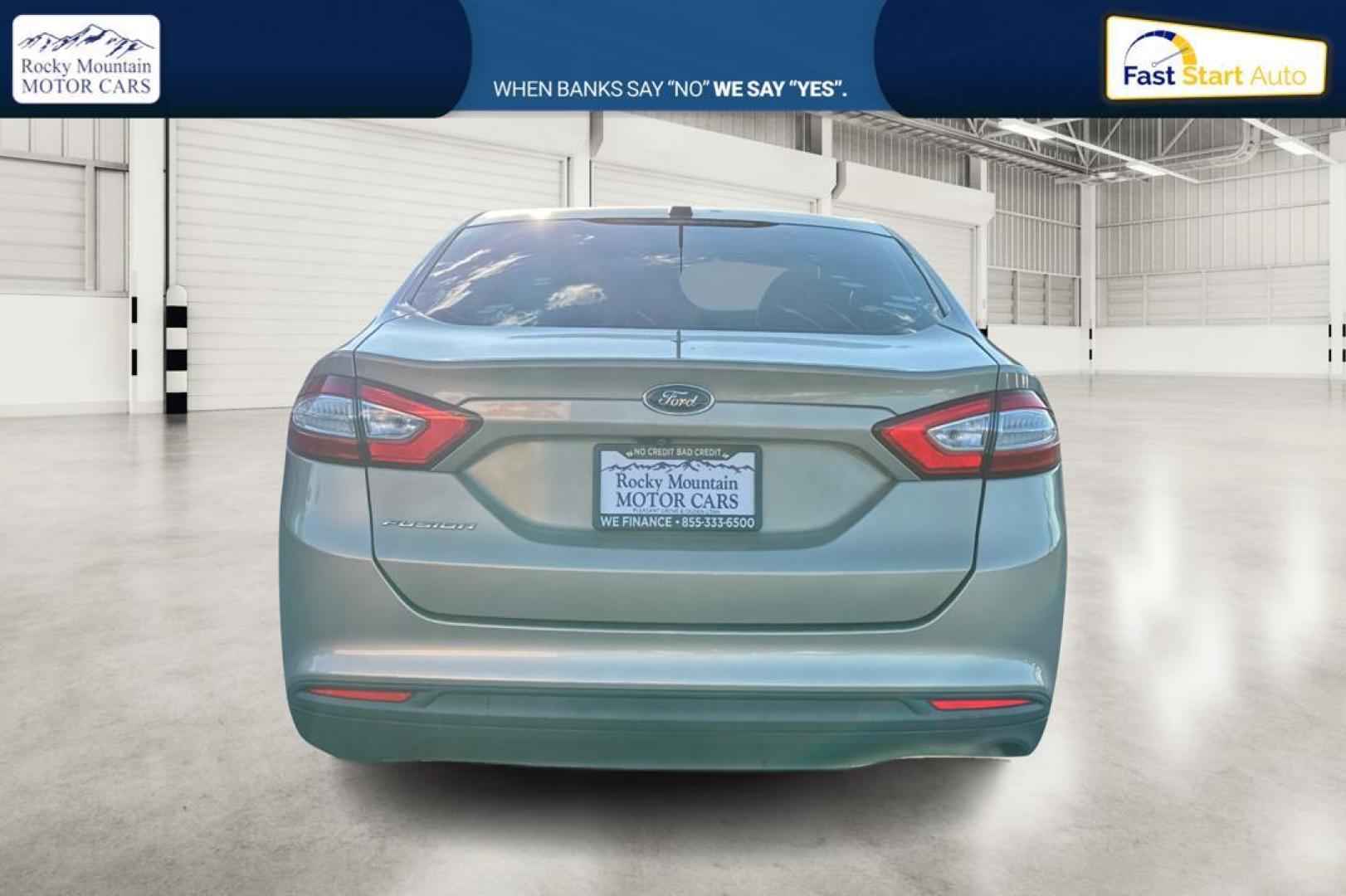 2015 Gray Ford Fusion S (3FA6P0G77FR) with an 2.5L L4 DOHC 16V engine, Auto, 6-Spd w/SelShft transmission, located at 7755 State Street, Midvale, UT, 84047, (801) 753-9063, 40.610329, -111.890656 - Photo#4