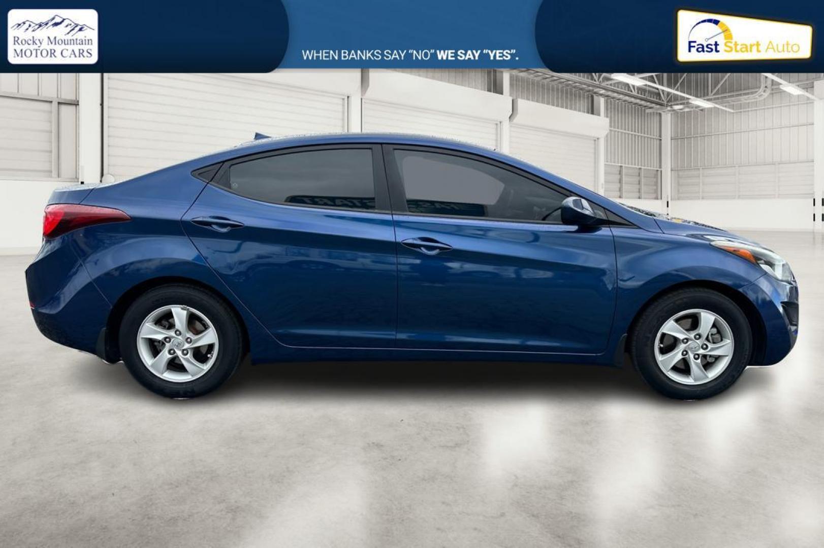 2015 Blue Hyundai Elantra Limited (5NPDH4AE3FH) with an 1.8L L4 DOHC 16V engine, 6-Speed Automatic transmission, located at 344 S Washington Blvd, Ogden, UT, 84404, (801) 399-1799, 41.255482, -111.970848 - Photo#1