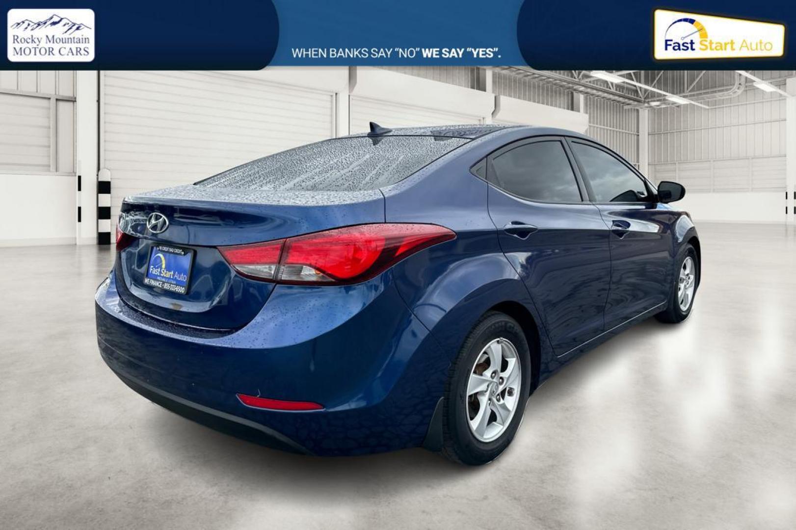 2015 Blue Hyundai Elantra Limited (5NPDH4AE3FH) with an 1.8L L4 DOHC 16V engine, 6-Speed Automatic transmission, located at 344 S Washington Blvd, Ogden, UT, 84404, (801) 399-1799, 41.255482, -111.970848 - Photo#2
