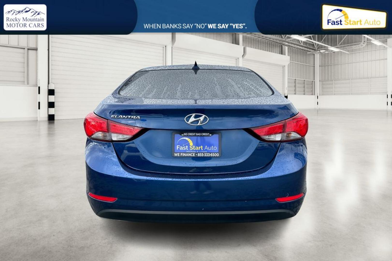 2015 Blue Hyundai Elantra Limited (5NPDH4AE3FH) with an 1.8L L4 DOHC 16V engine, 6-Speed Automatic transmission, located at 344 S Washington Blvd, Ogden, UT, 84404, (801) 399-1799, 41.255482, -111.970848 - Photo#4