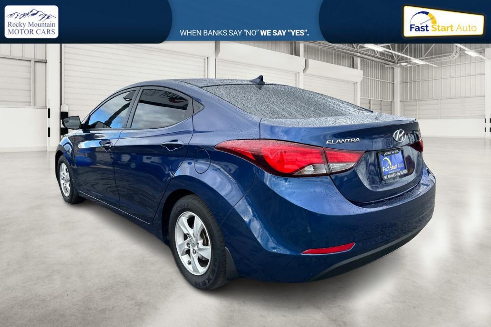 2015 Blue Hyundai Elantra Limited (5NPDH4AE3FH) with an 1.8L L4 DOHC 16V engine, 6-Speed Automatic transmission, located at 344 S Washington Blvd, Ogden, UT, 84404, (801) 399-1799, 41.255482, -111.970848 - Photo#5