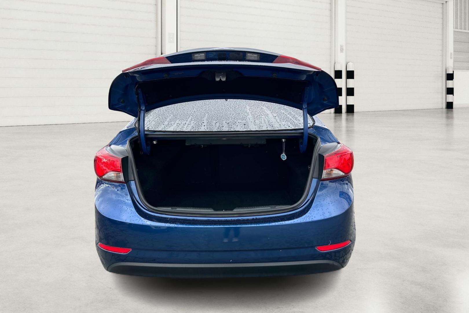 2015 Blue Hyundai Elantra Limited (5NPDH4AE3FH) with an 1.8L L4 DOHC 16V engine, 6-Speed Automatic transmission, located at 344 S Washington Blvd, Ogden, UT, 84404, (801) 399-1799, 41.255482, -111.970848 - Photo#13