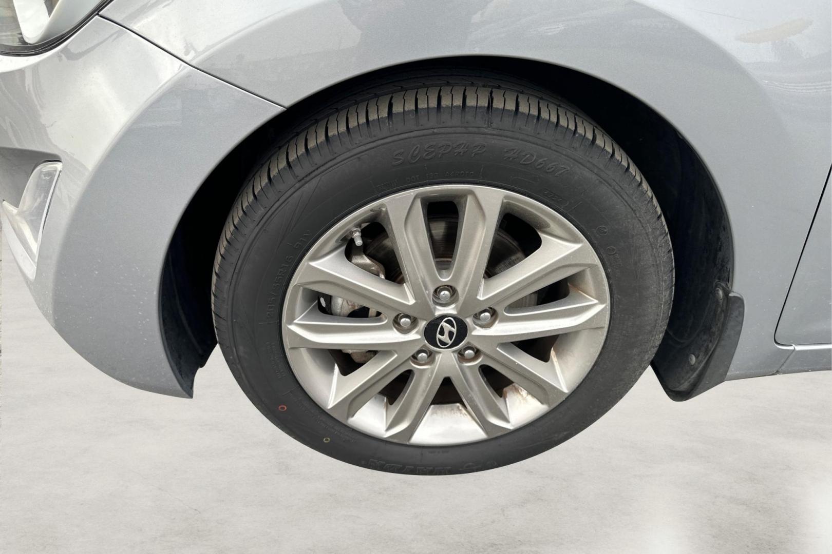 2015 Silver Hyundai Elantra Limited (5NPDH4AE9FH) with an 1.8L L4 DOHC 16V engine, 6-Speed Automatic transmission, located at 7755 State Street, Midvale, UT, 84047, (801) 753-9063, 40.610329, -111.890656 - Photo#12