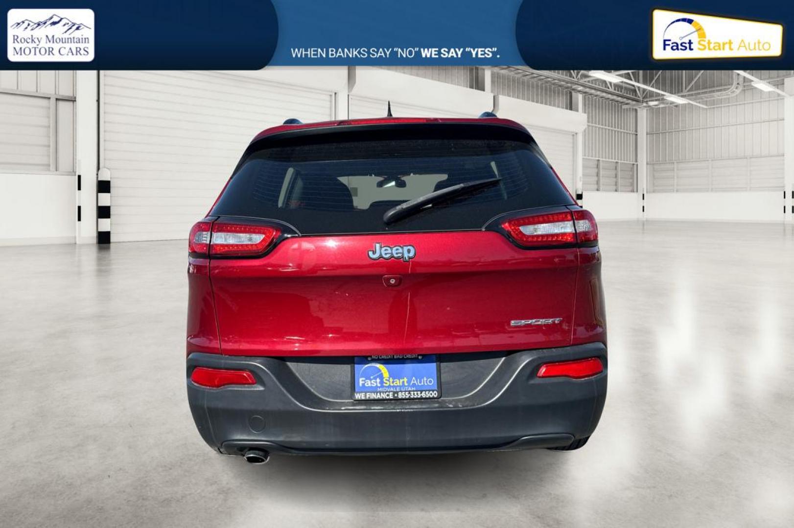 2015 Red Jeep Cherokee Sport FWD (1C4PJLAB8FW) with an 2.4L L4 DOHC 16V engine, 9-Speed Automatic transmission, located at 7755 State Street, Midvale, UT, 84047, (801) 753-9063, 40.610329, -111.890656 - Photo#4