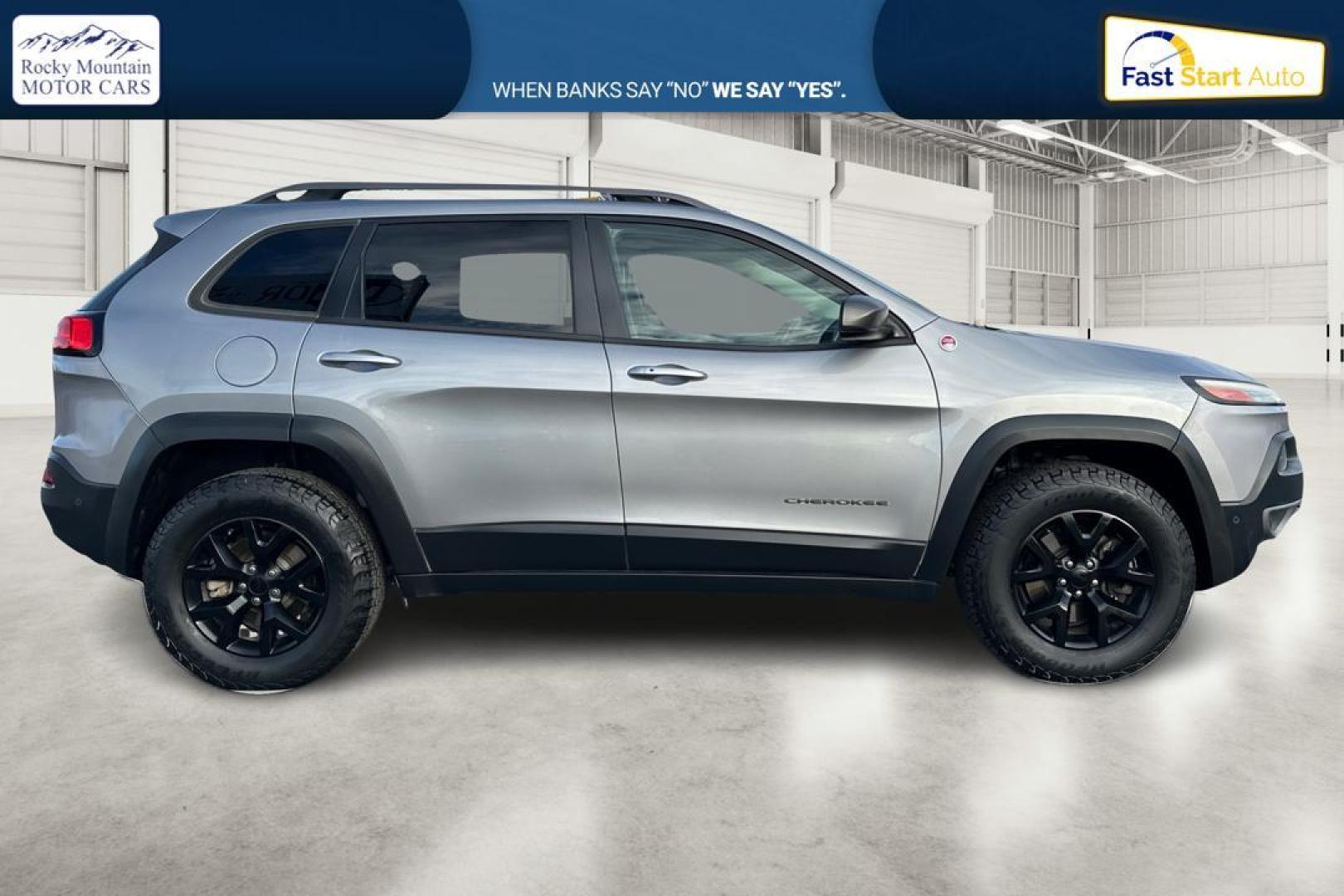 2015 Silver Jeep Cherokee Trailhawk 4WD (1C4PJMBS9FW) with an 3.2L V6 DOHC 24V engine, 9-Speed Automatic transmission, located at 7755 State Street, Midvale, UT, 84047, (801) 753-9063, 40.610329, -111.890656 - Photo#1