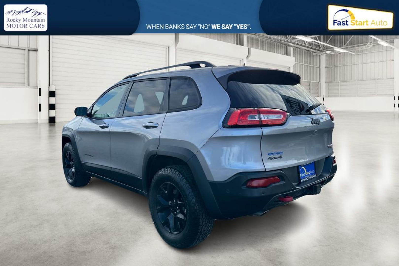 2015 Silver Jeep Cherokee Trailhawk 4WD (1C4PJMBS9FW) with an 3.2L V6 DOHC 24V engine, 9-Speed Automatic transmission, located at 7755 State Street, Midvale, UT, 84047, (801) 753-9063, 40.610329, -111.890656 - Photo#5