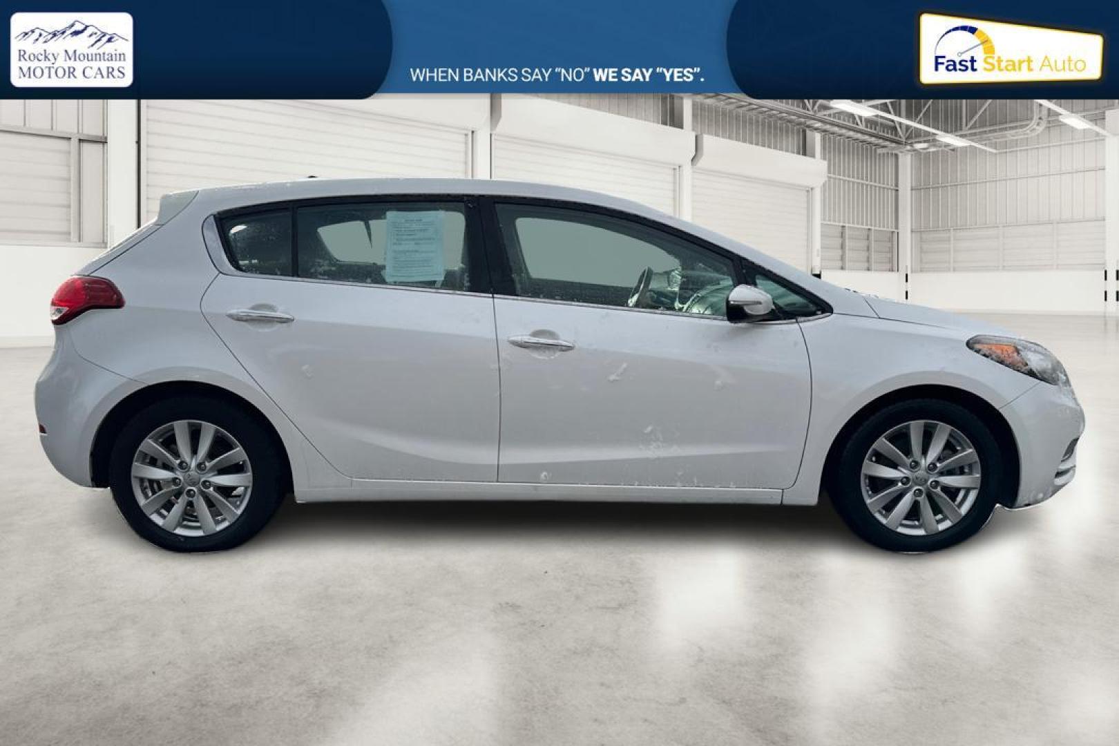 2015 White Kia Forte 5-Door EX (KNAFX5A83F5) with an 2.0L L4 DOHC 16V engine, 6-Speed Automatic transmission, located at 7755 State Street, Midvale, UT, 84047, (801) 753-9063, 40.610329, -111.890656 - Photo#1