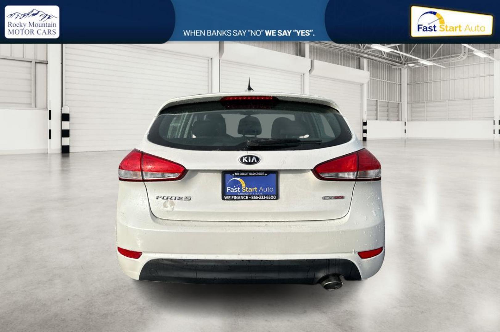 2015 White Kia Forte 5-Door EX (KNAFX5A83F5) with an 2.0L L4 DOHC 16V engine, 6-Speed Automatic transmission, located at 7755 State Street, Midvale, UT, 84047, (801) 753-9063, 40.610329, -111.890656 - Photo#4